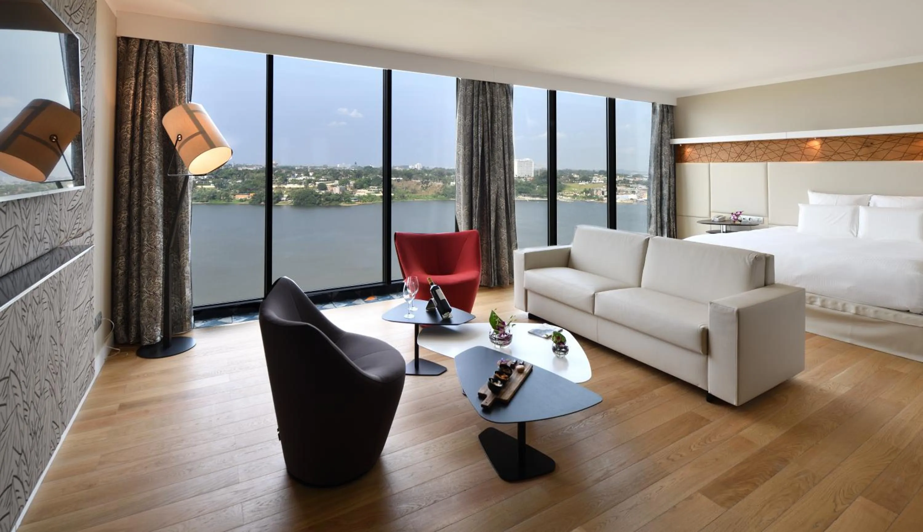 Living room, Bed in Pullman Abidjan