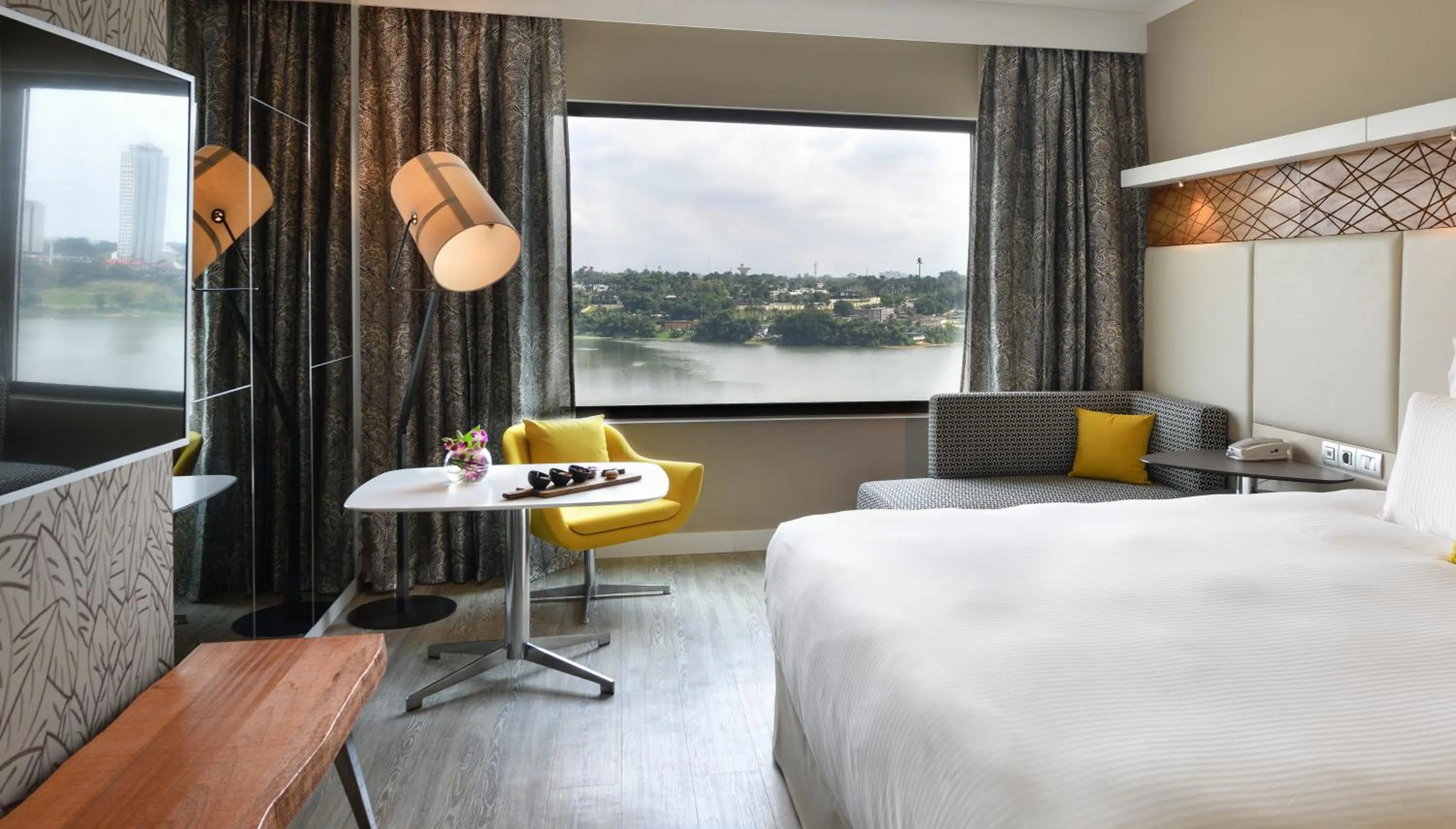 Photo of the whole room, Bed in Pullman Abidjan