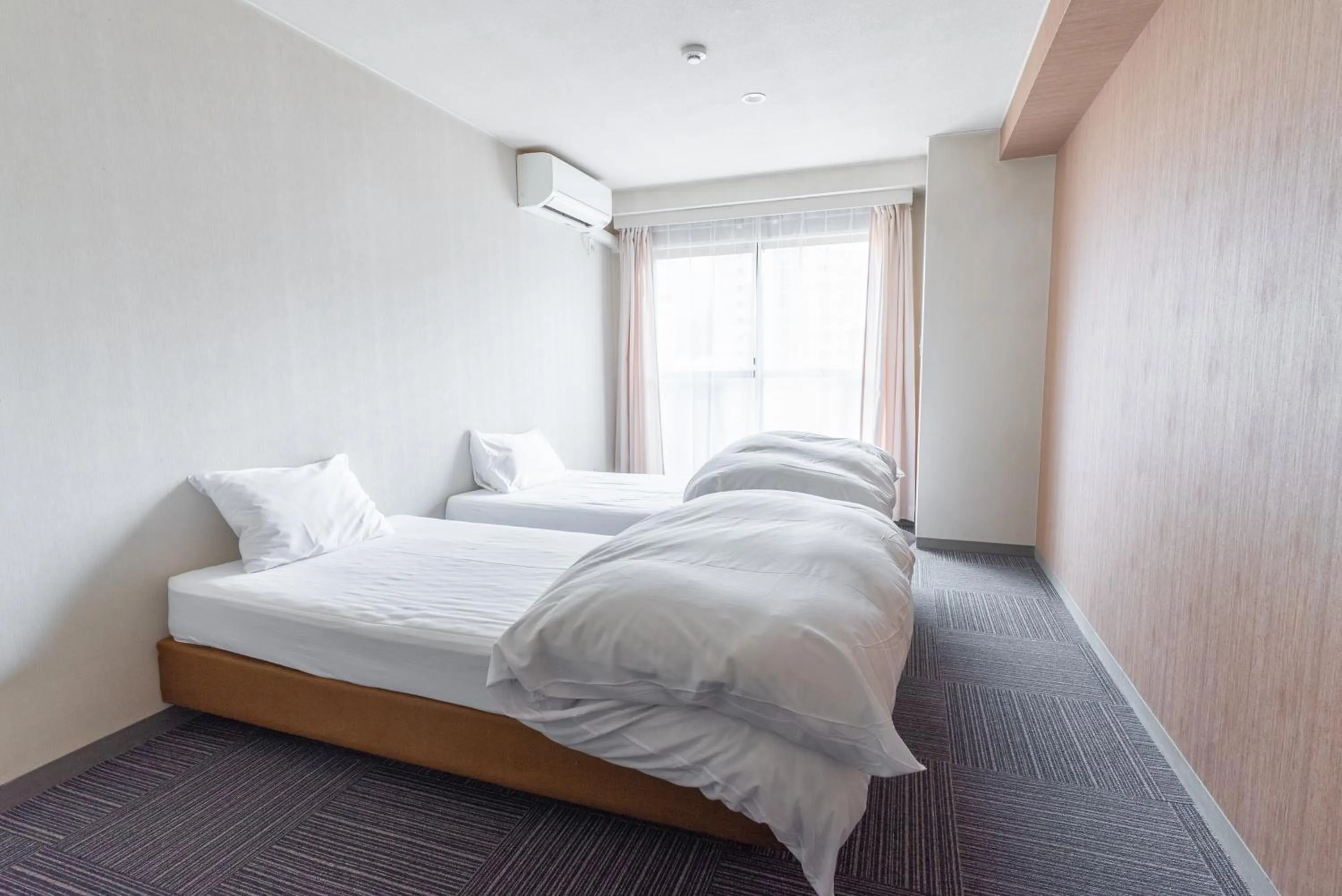 Bed in CHENDA INTERNATIONAL HOTEL