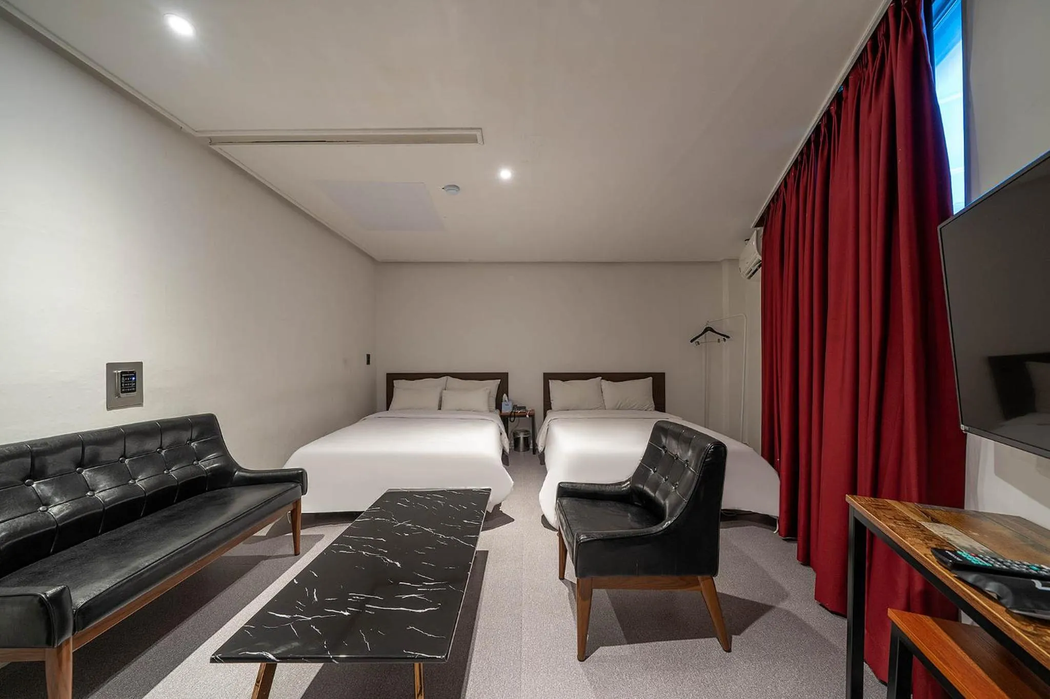 Bed in Pacific7 Hotel