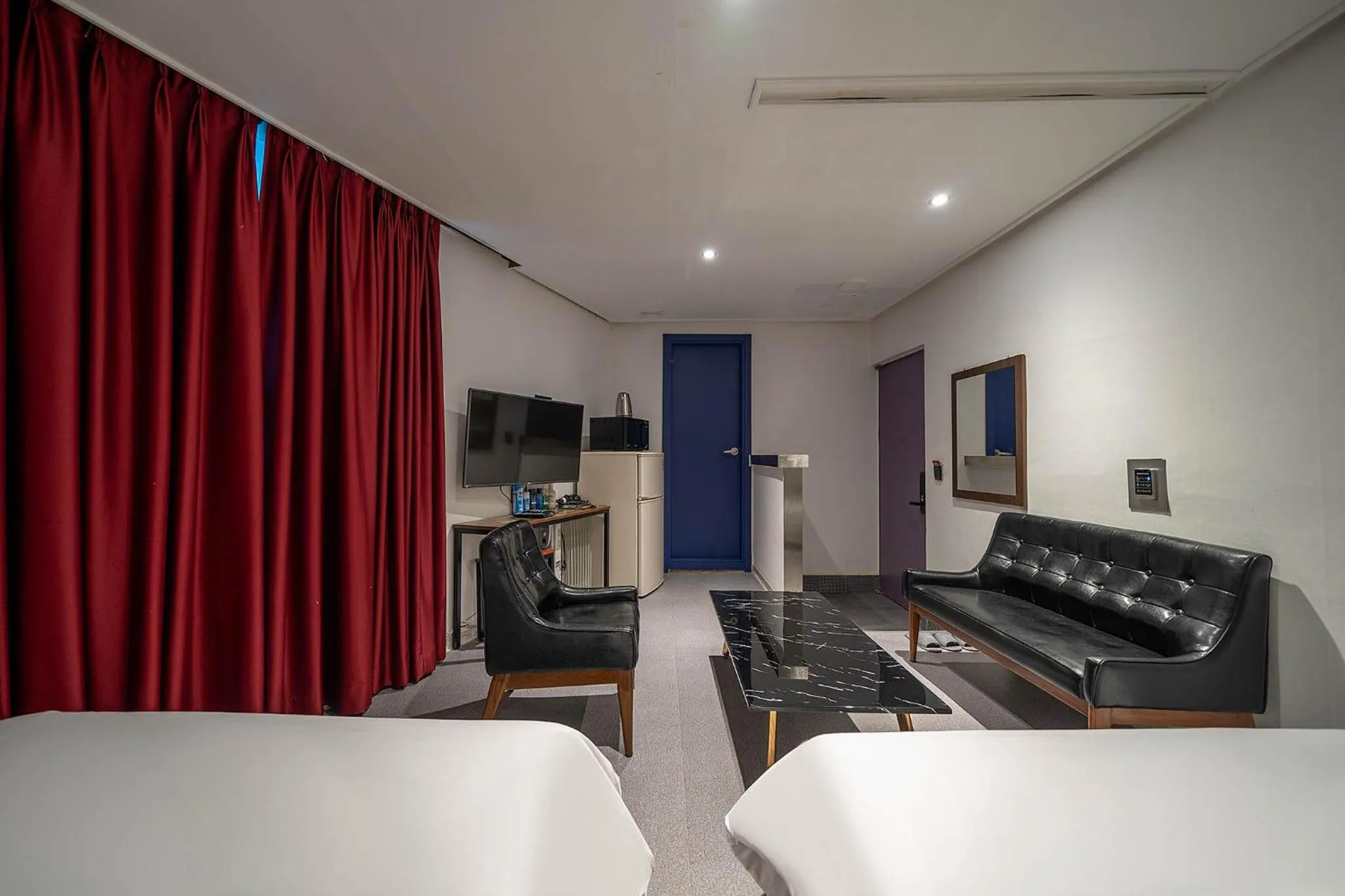 Bed in Pacific7 Hotel