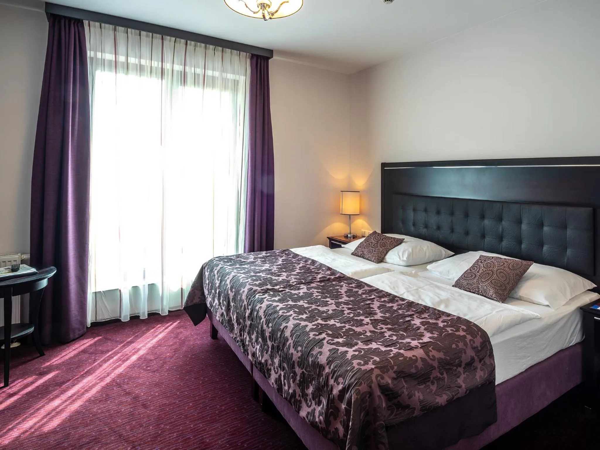 Bed in EA Embassy Prague Hotel