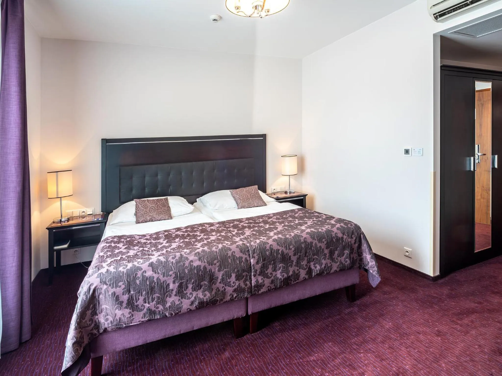 Bed in EA Embassy Prague Hotel