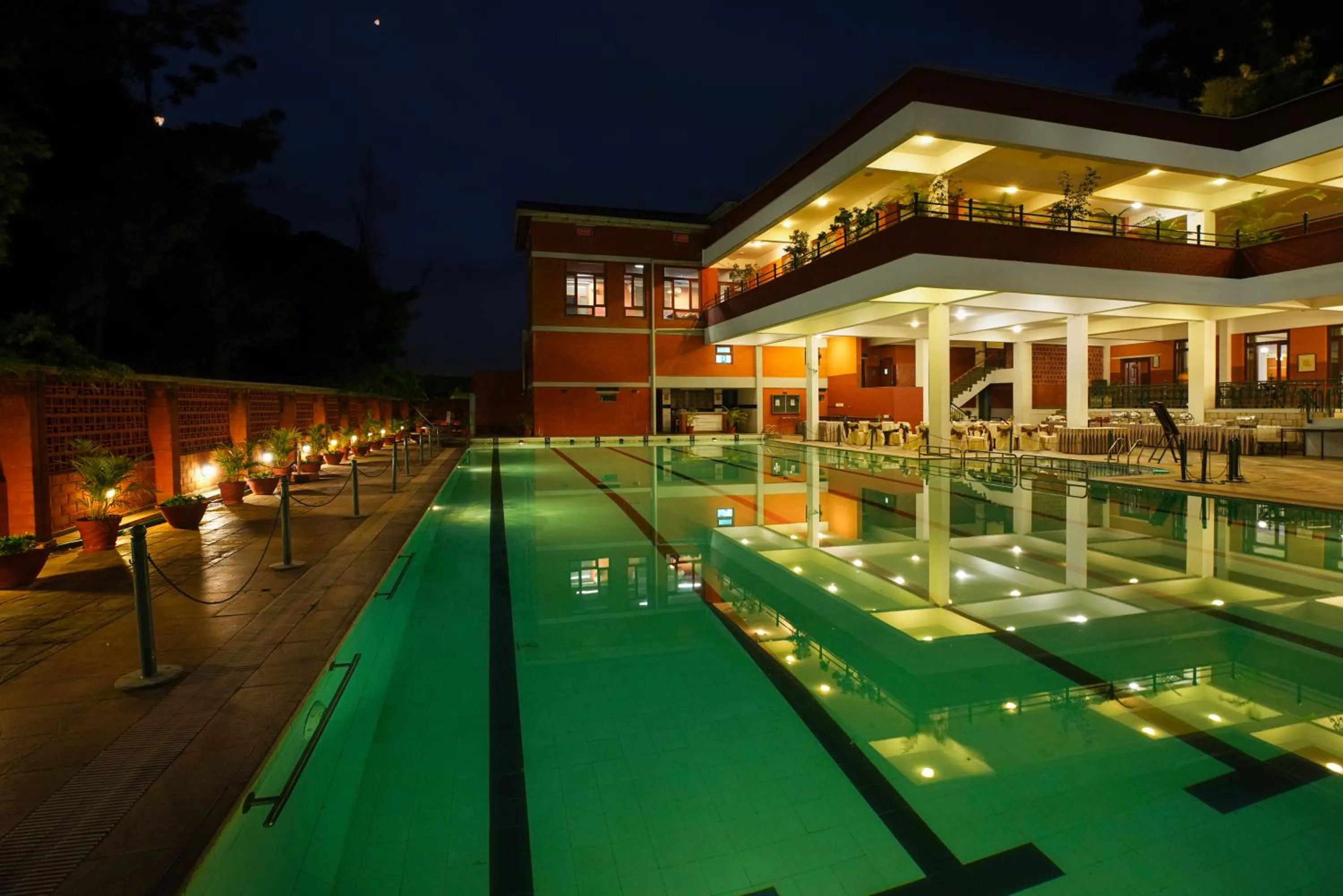 Swimming pool in Olde Bangalore Resort and Wellness Center