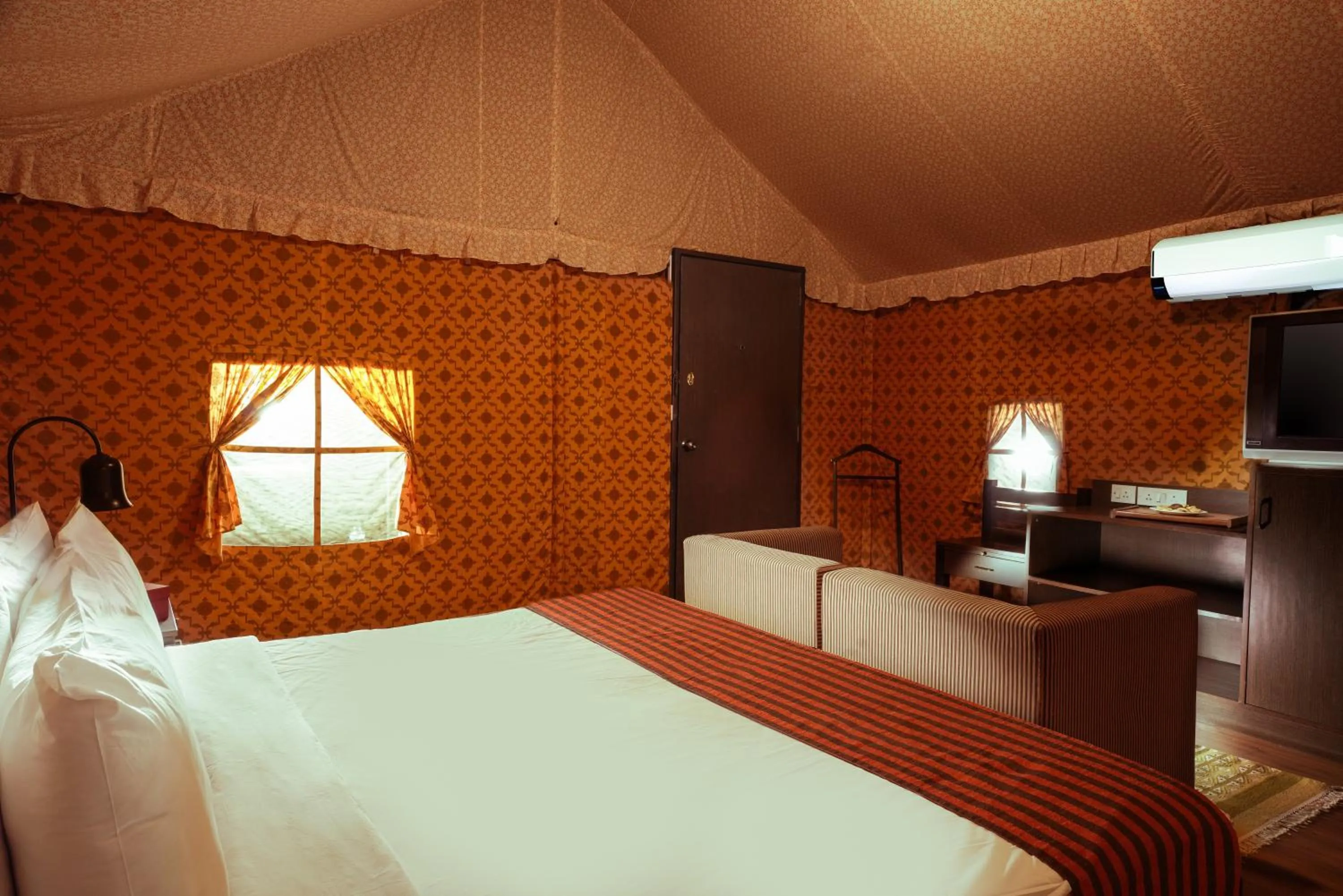 Bed in Olde Bangalore Resort and Wellness Center