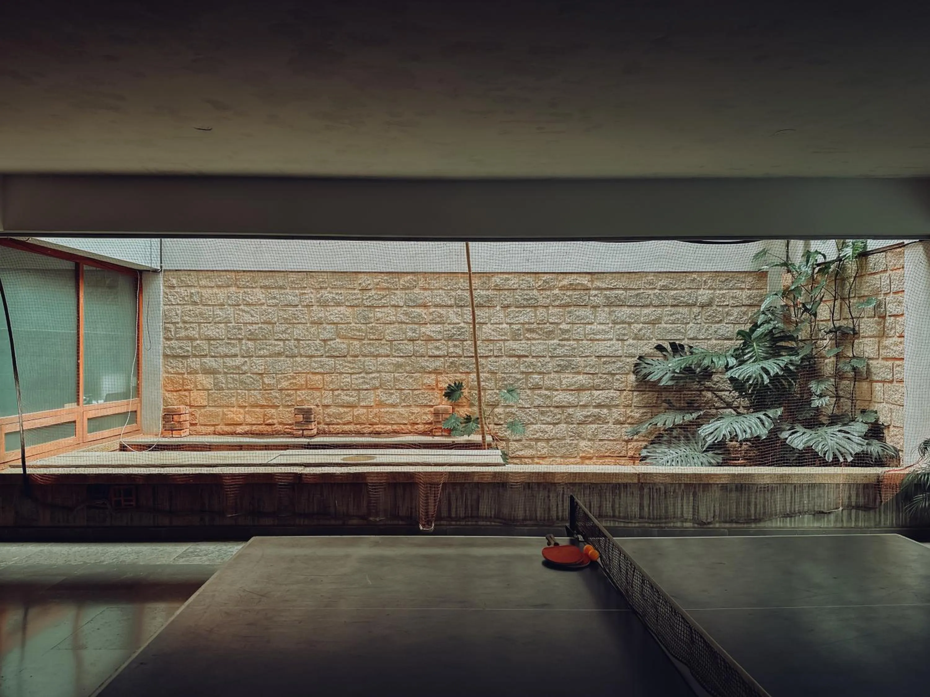 Tennis court in Olde Bangalore Resort and Wellness Center