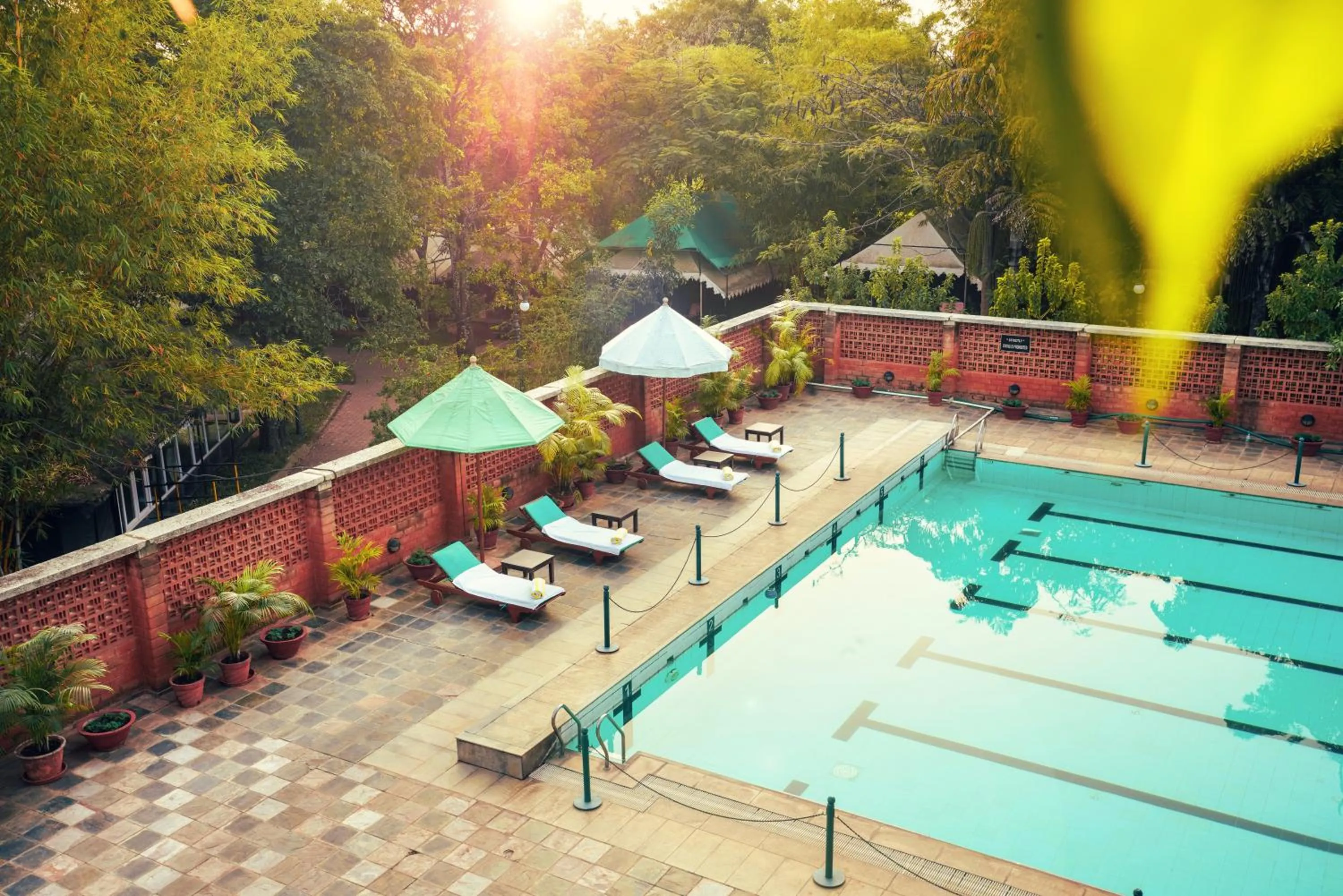 Swimming pool in Olde Bangalore Resort and Wellness Center