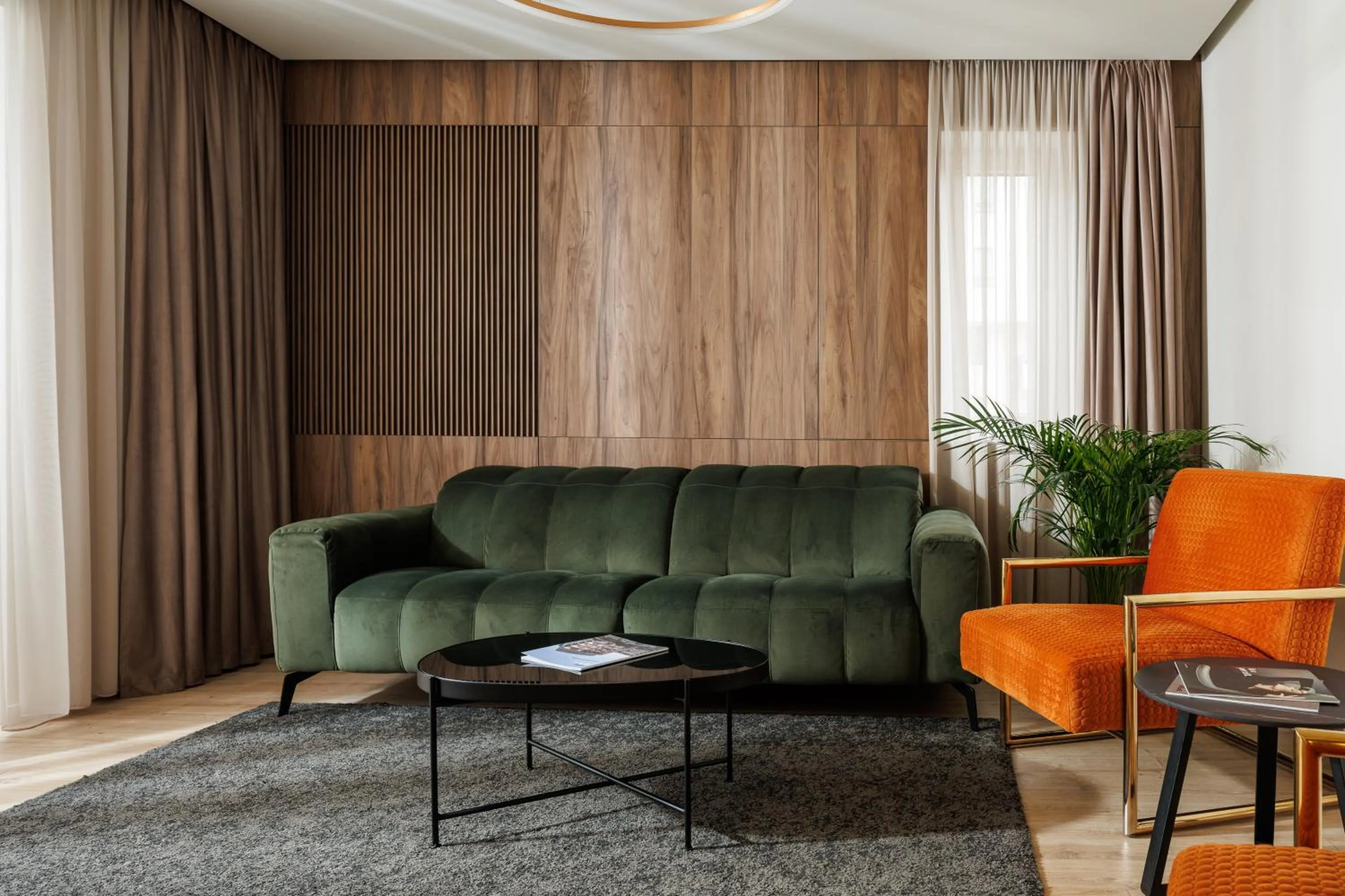 Living room in The Alley by Kanopian