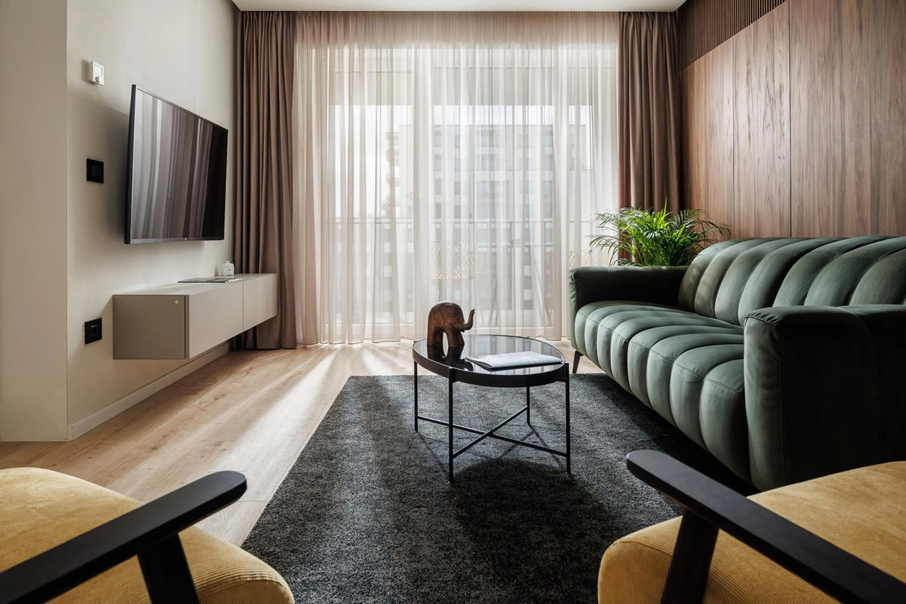 Living room in The Alley by Kanopian