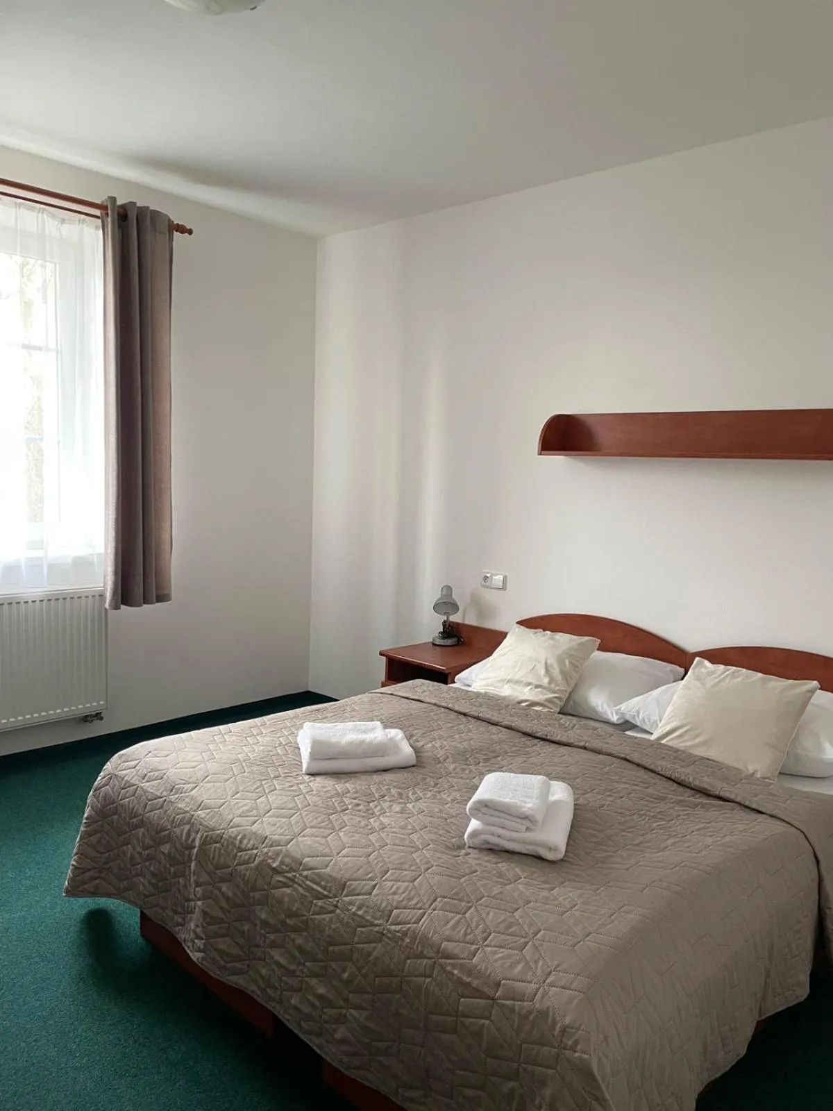 Bed in Hotel Karolina