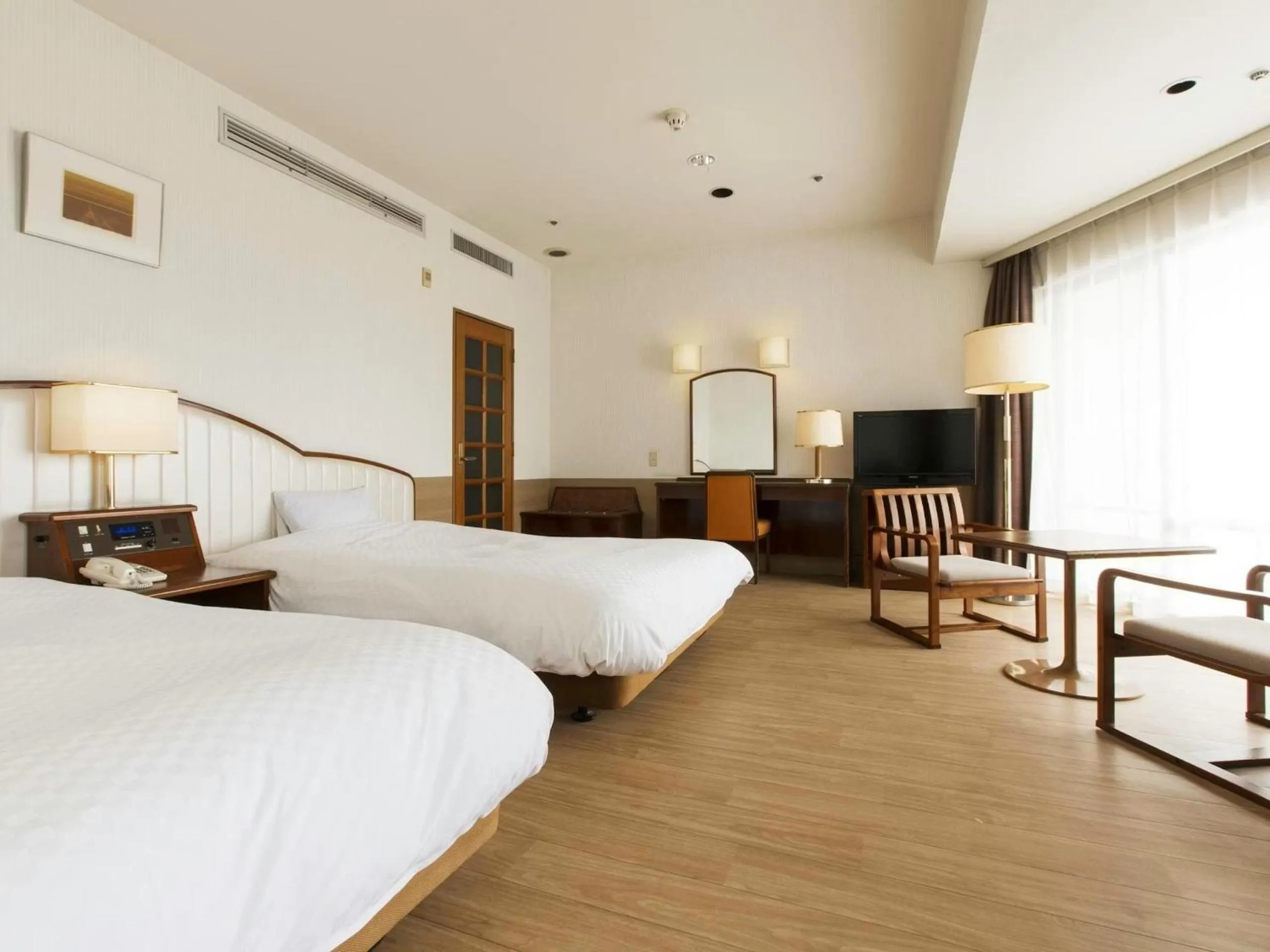 Bed in Izu-Kogen Wan Wan Paradise Hotel & Cottage