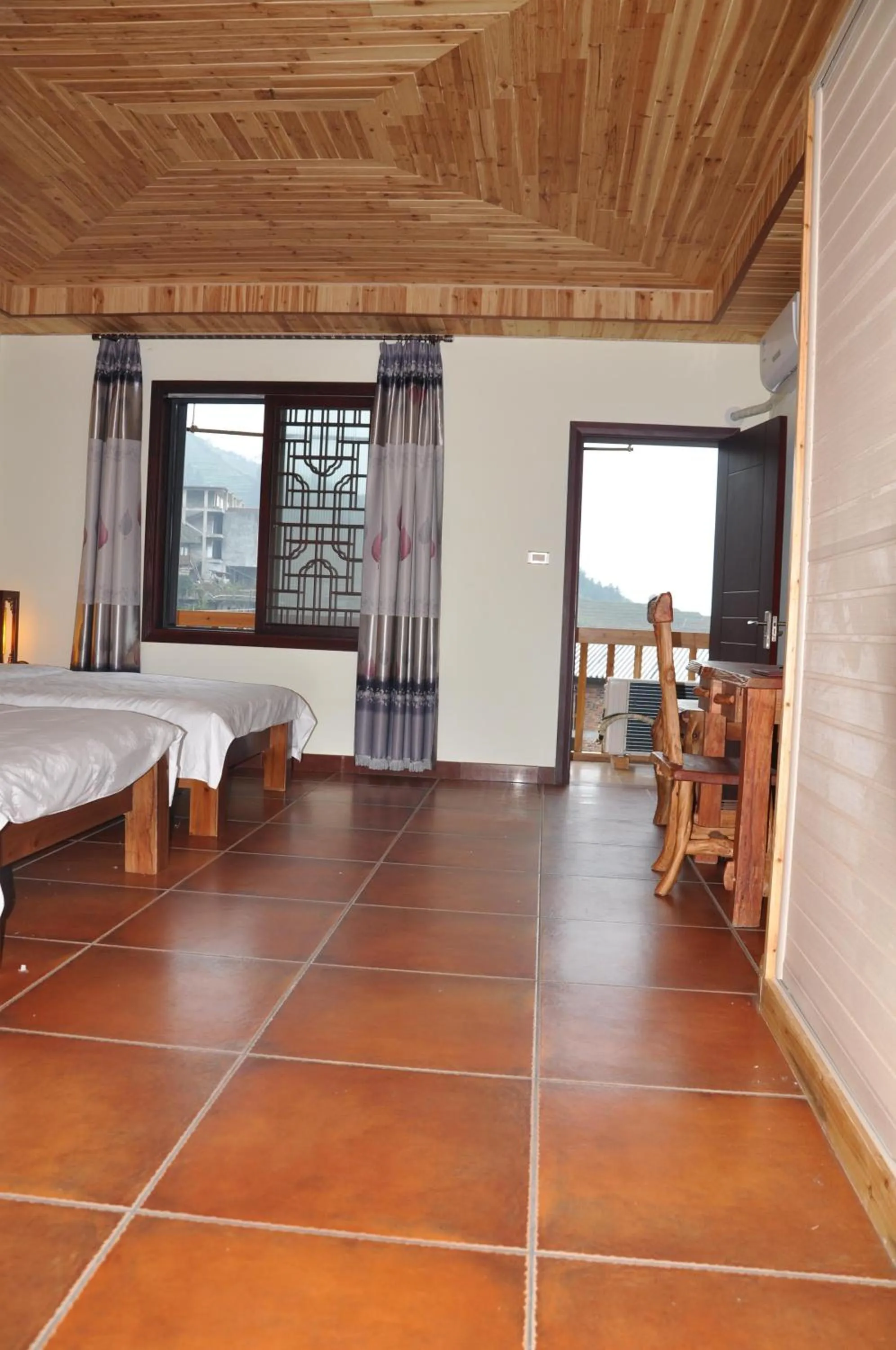 Photo of the whole room in Longji Holiday Hotel