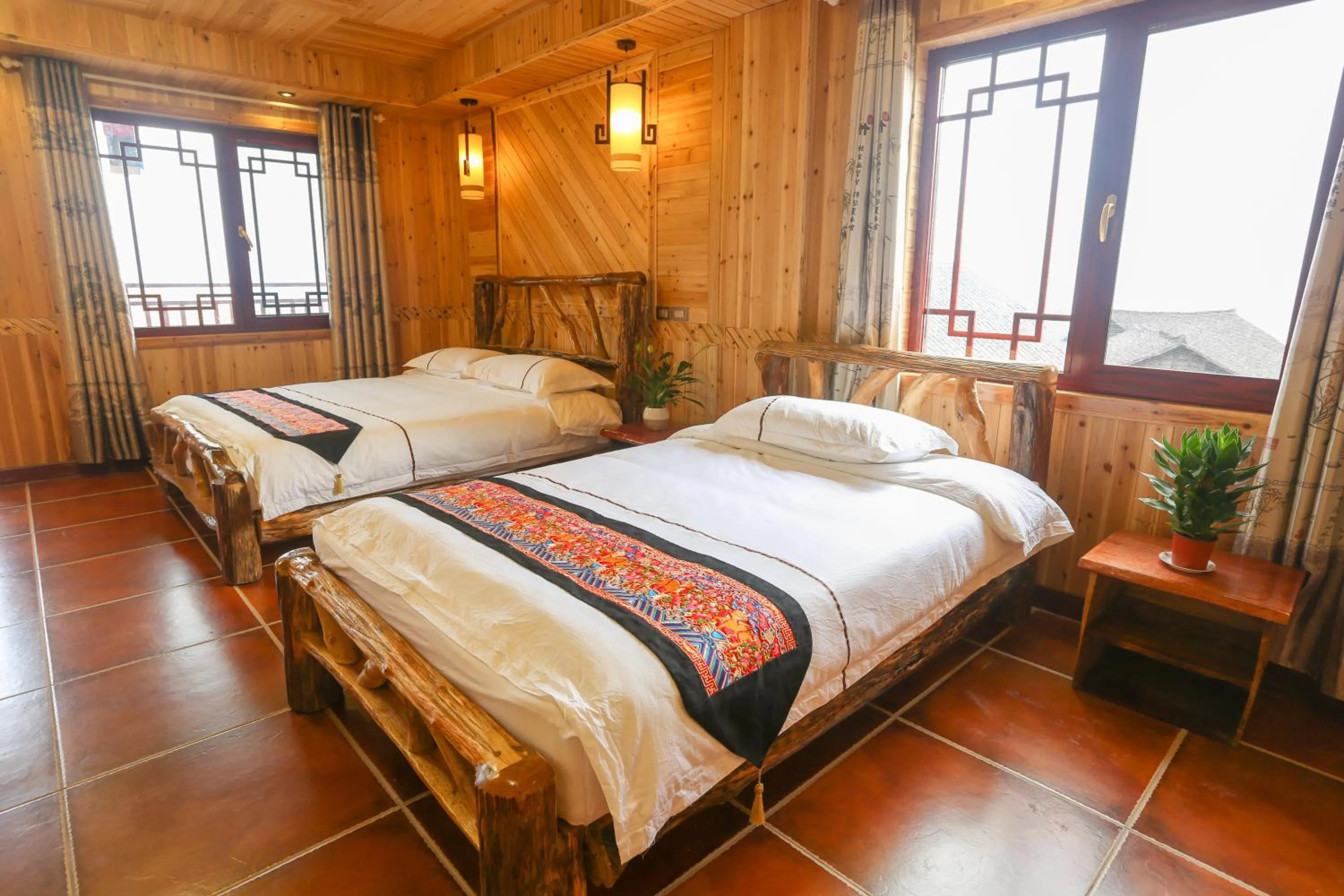 Photo of the whole room, Bed in Longji Holiday Hotel
