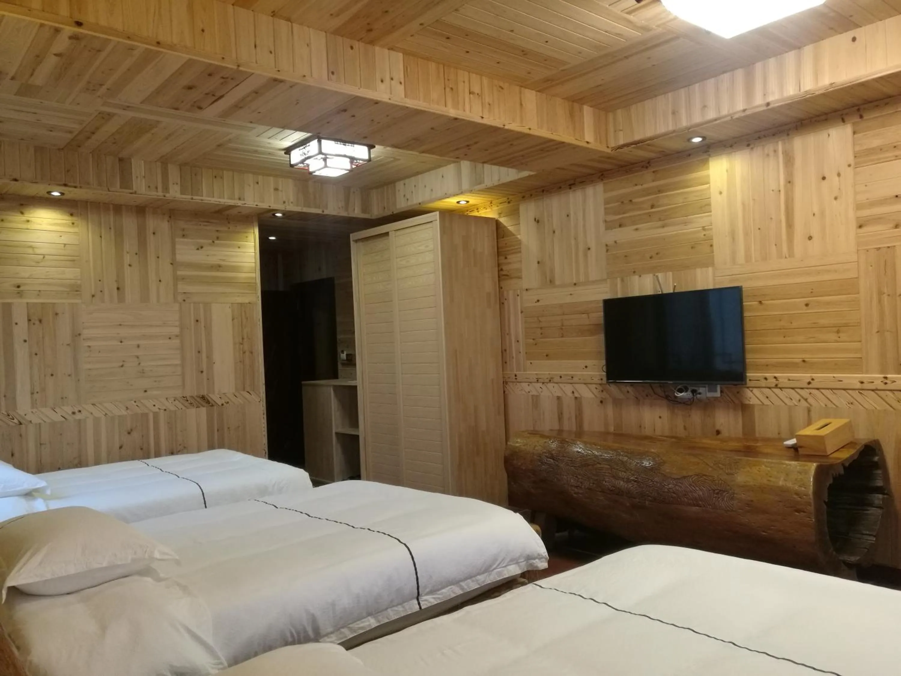 Decorative detail, Bed in Longji Holiday Hotel