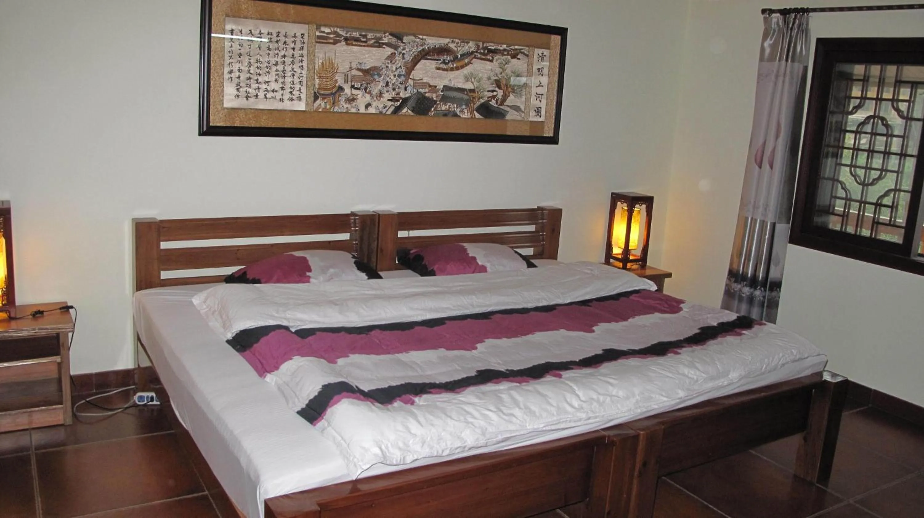 Bed in Longji Holiday Hotel