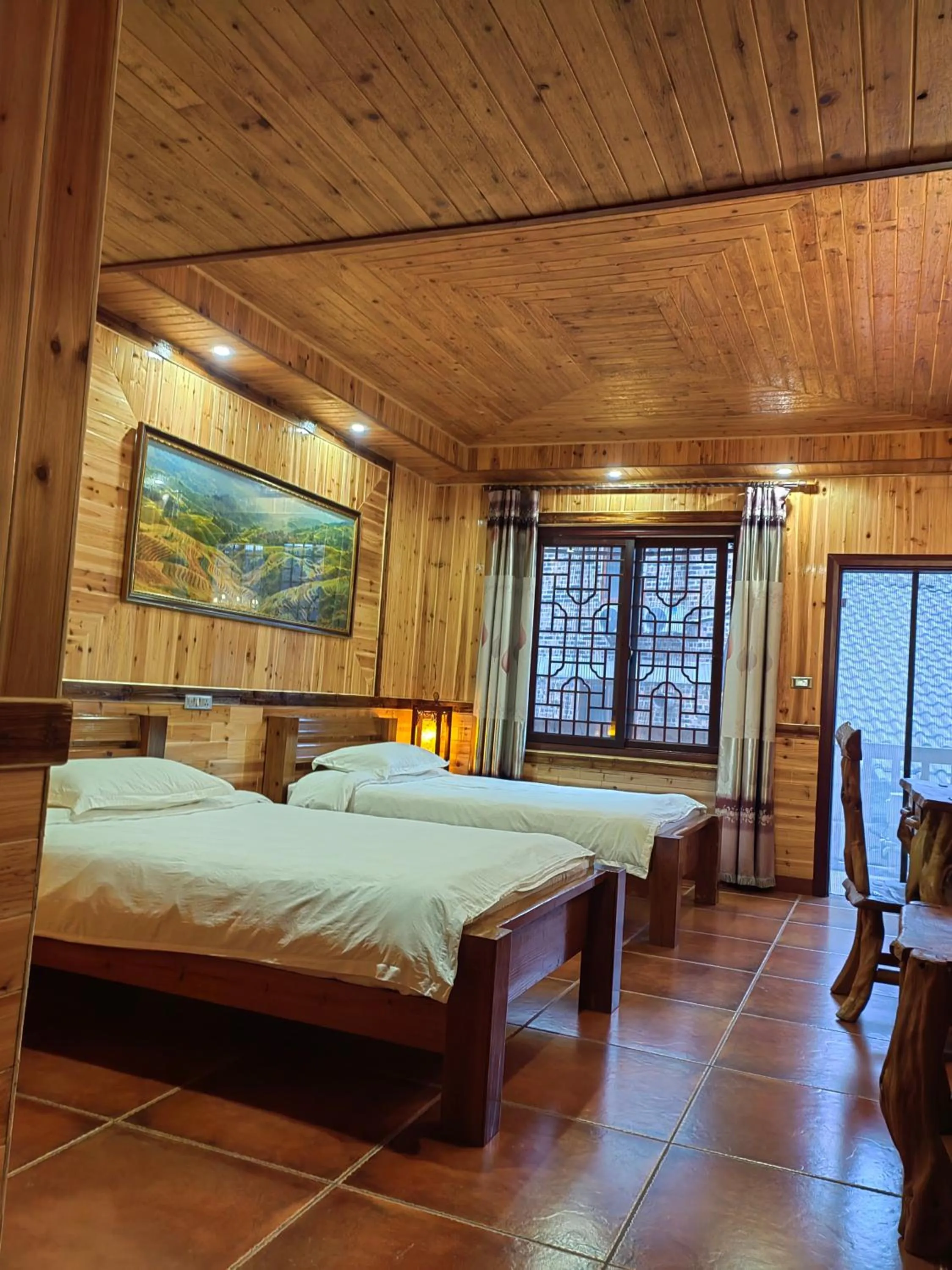 Photo of the whole room, Bed in Longji Holiday Hotel