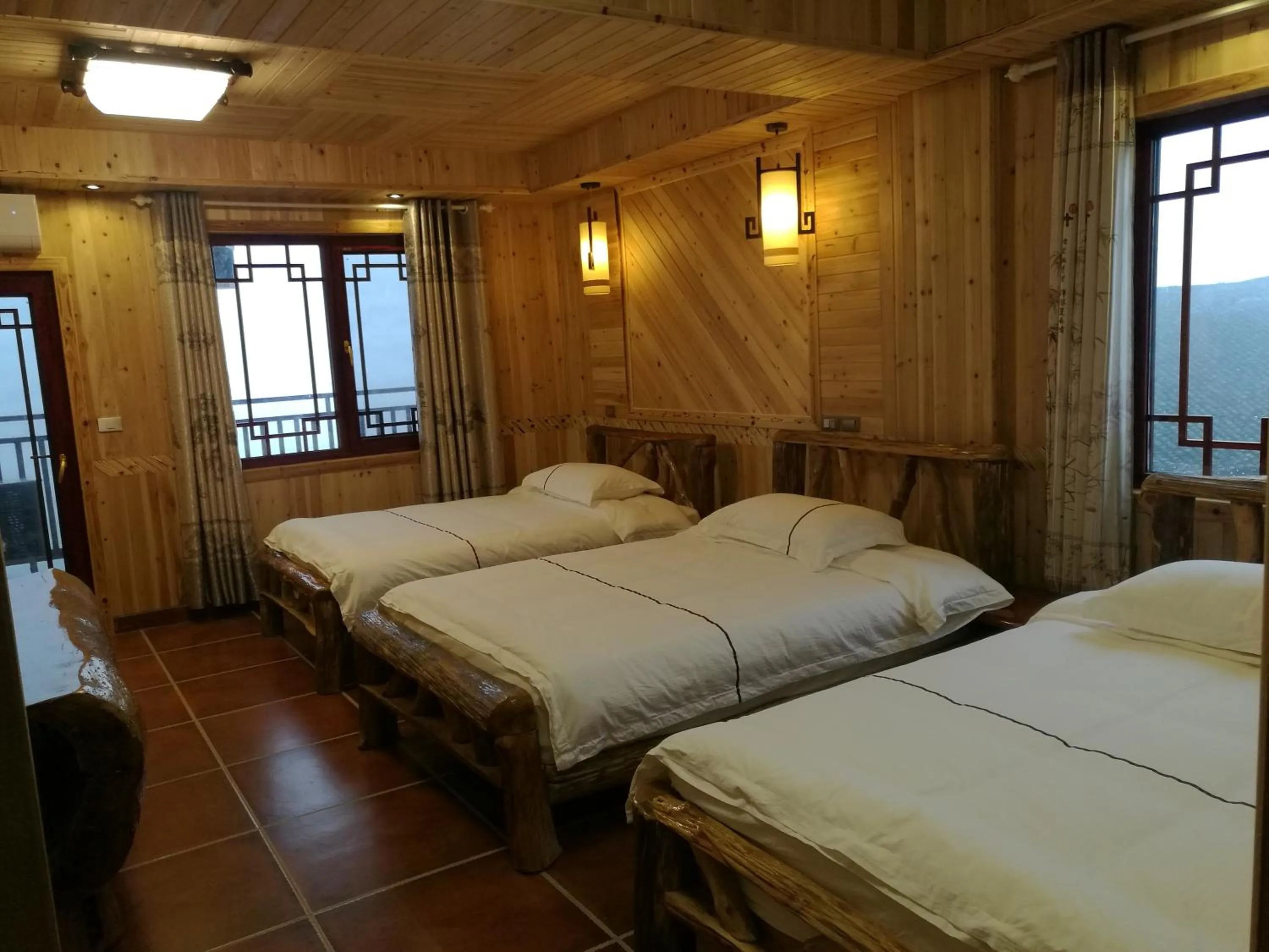 Decorative detail, Bed in Longji Holiday Hotel