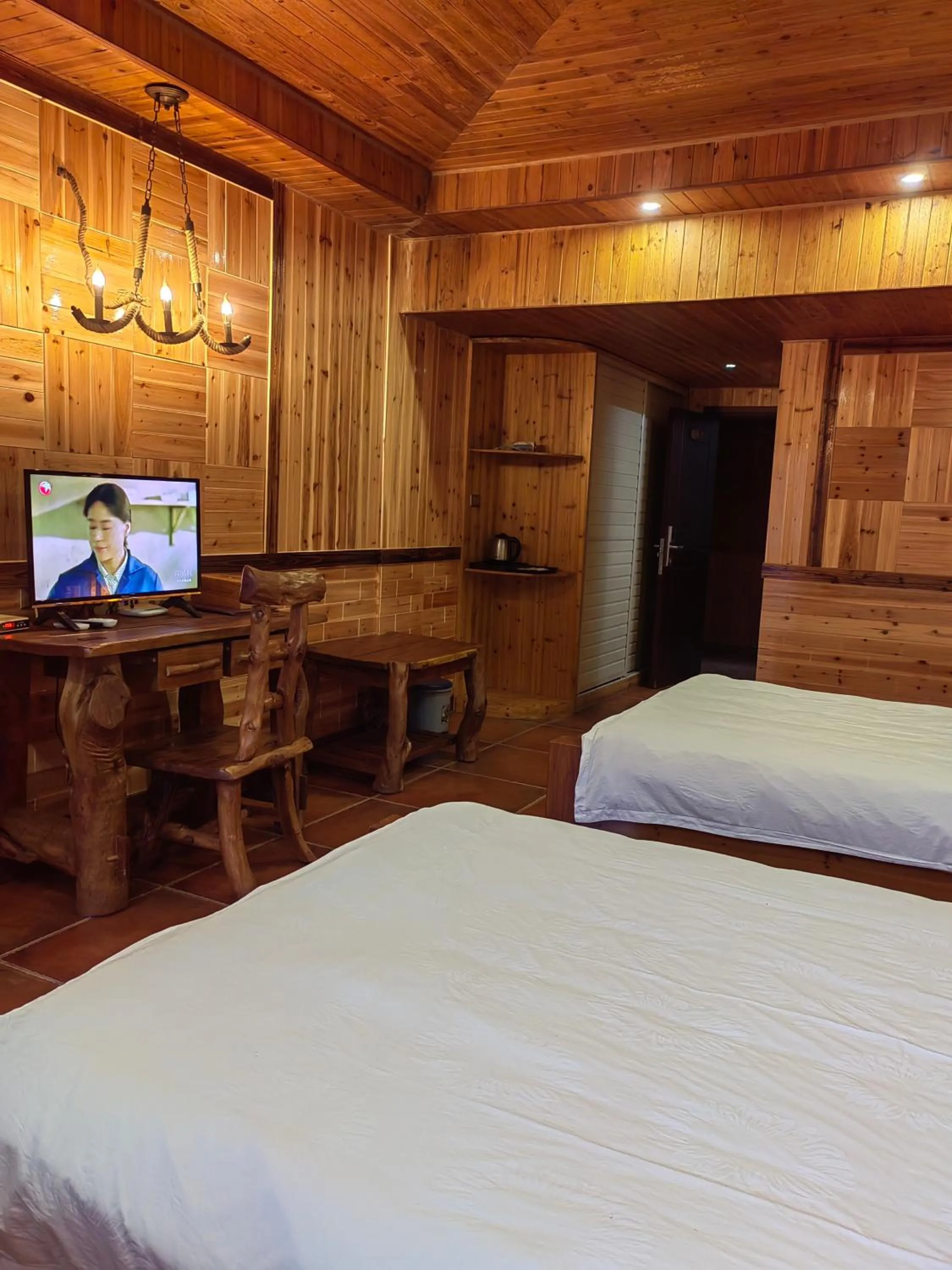 Photo of the whole room, Bed in Longji Holiday Hotel