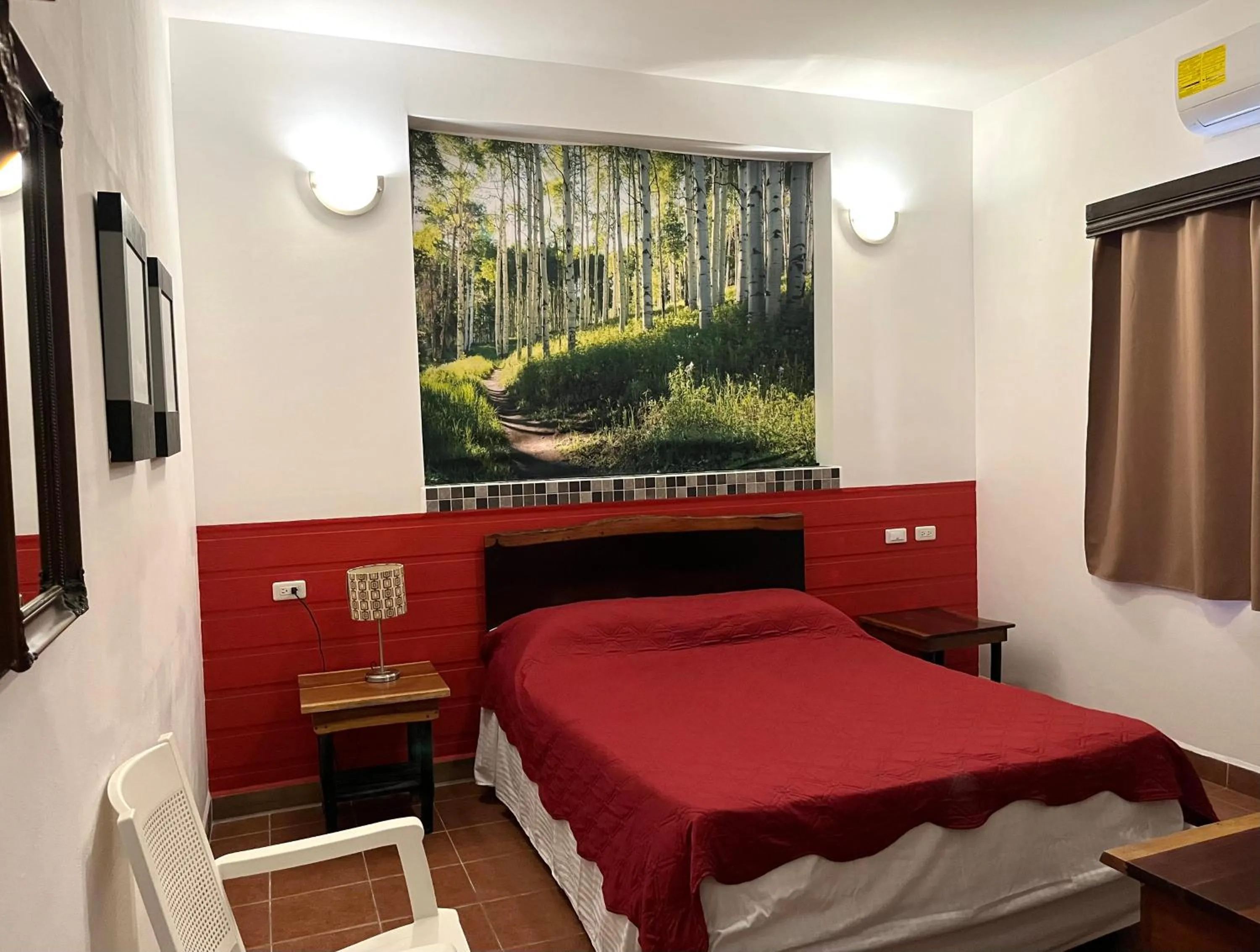 Bed in Easy Inn Hotel