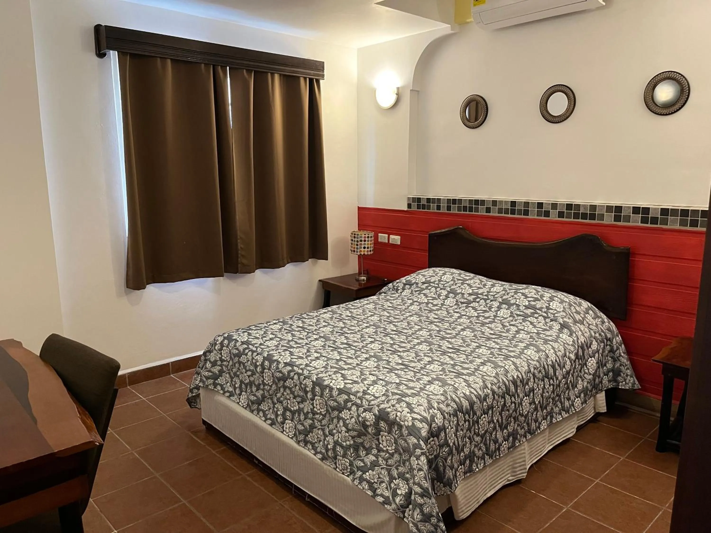 Bed in Easy Inn Hotel