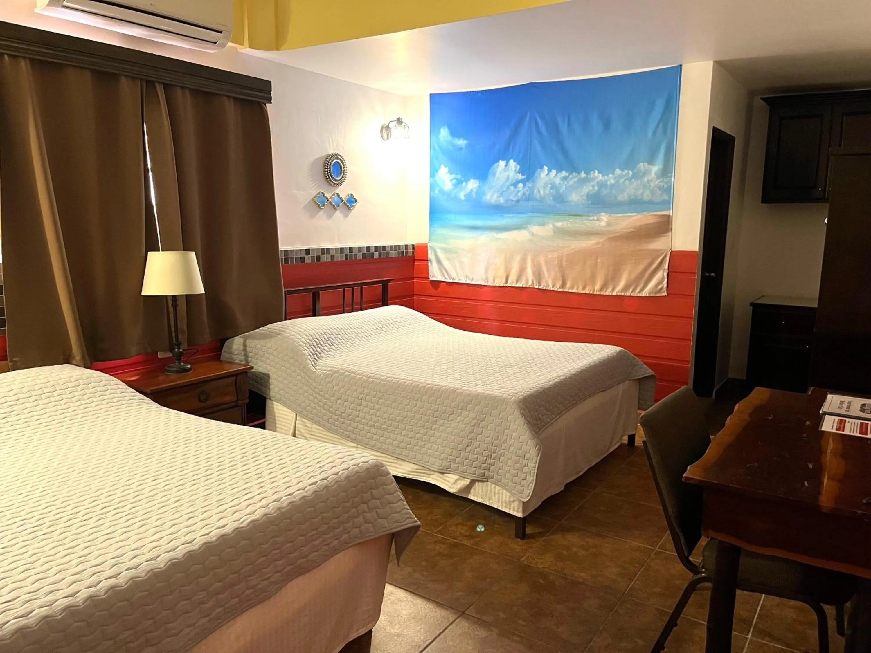 Bed in Easy Inn Hotel