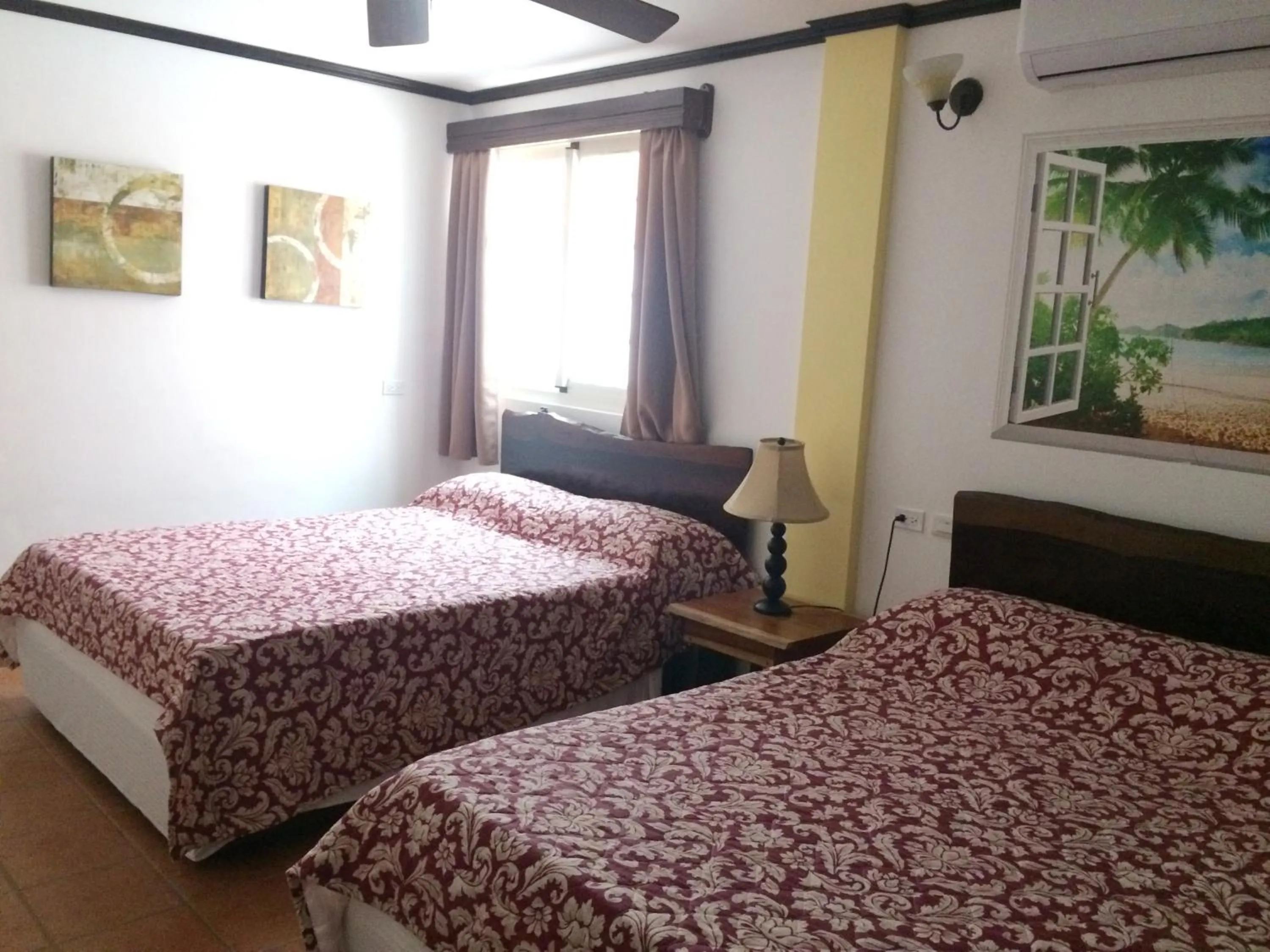 Bed in Easy Inn Hotel