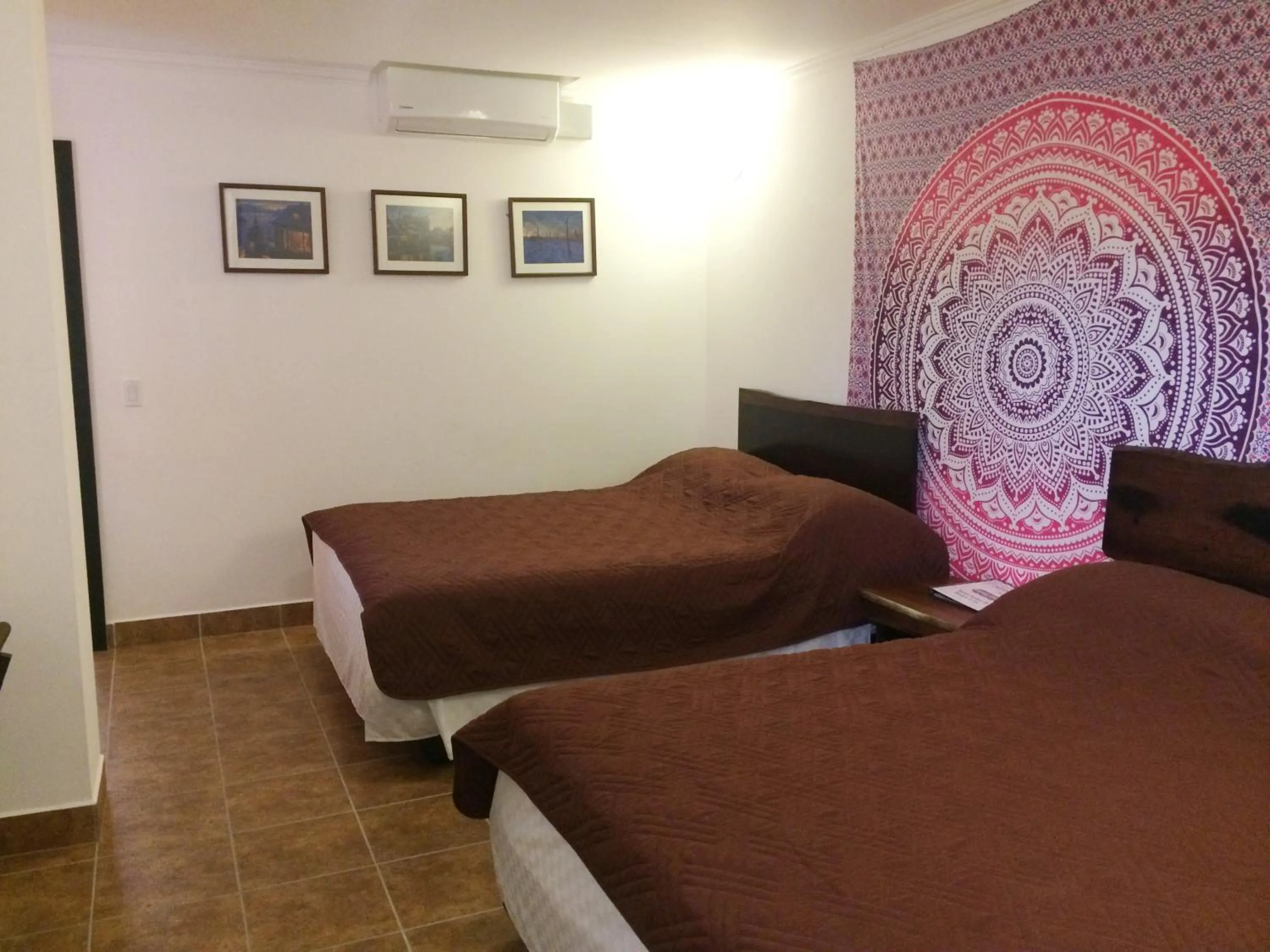 Bed in Easy Inn Hotel