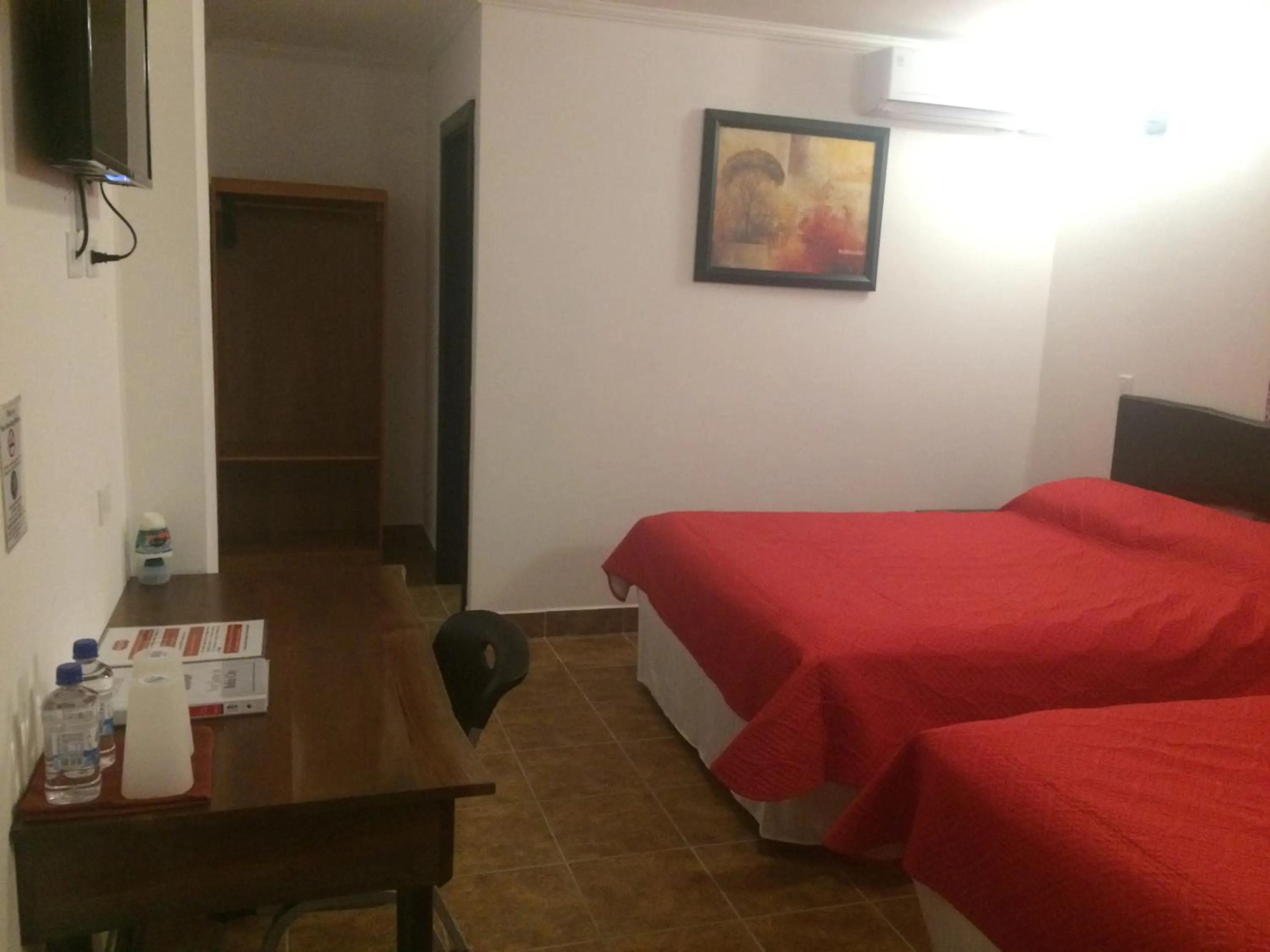 Bed in Easy Inn Hotel