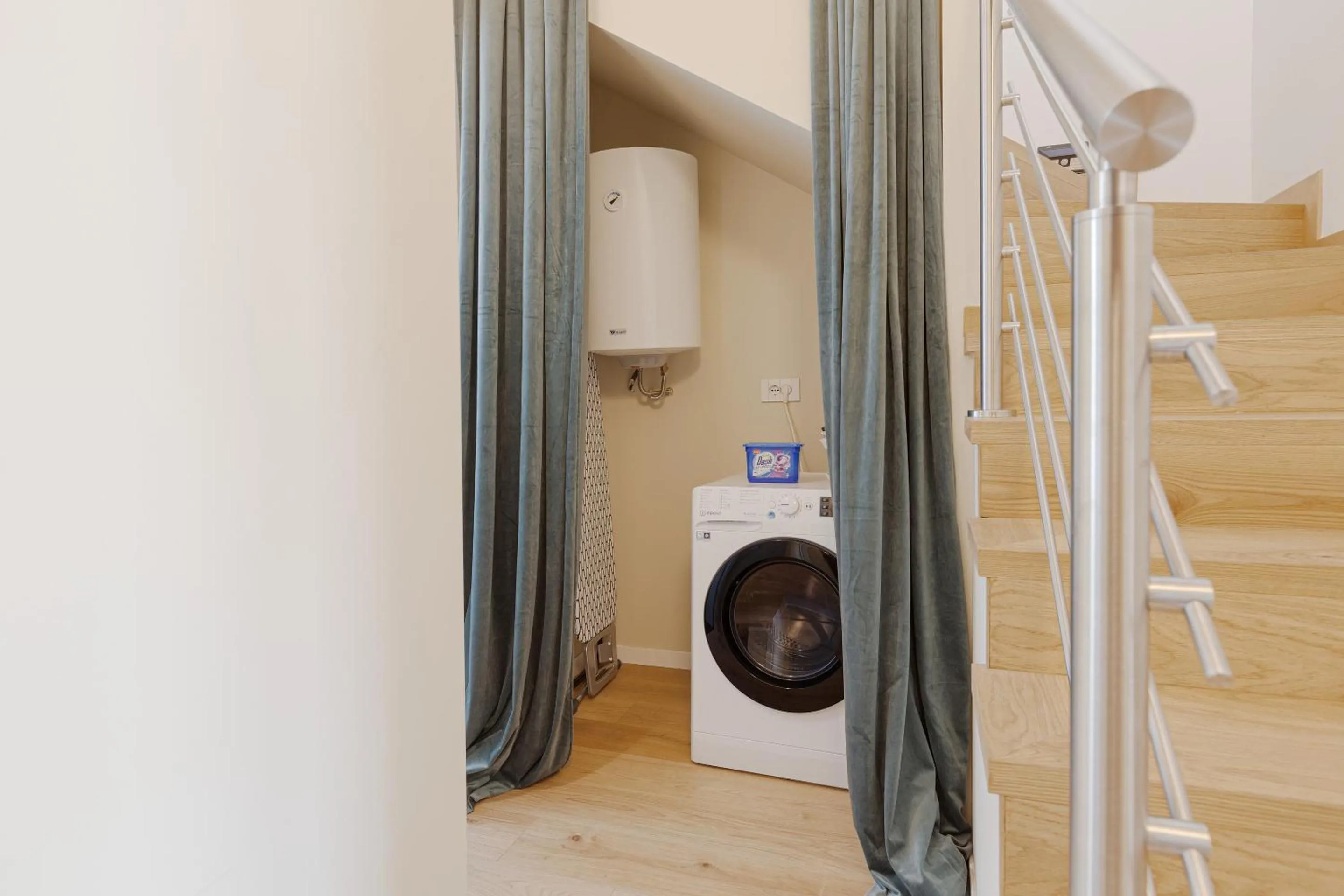 washing machine in Heart Milan Apartments Sforza Duomo