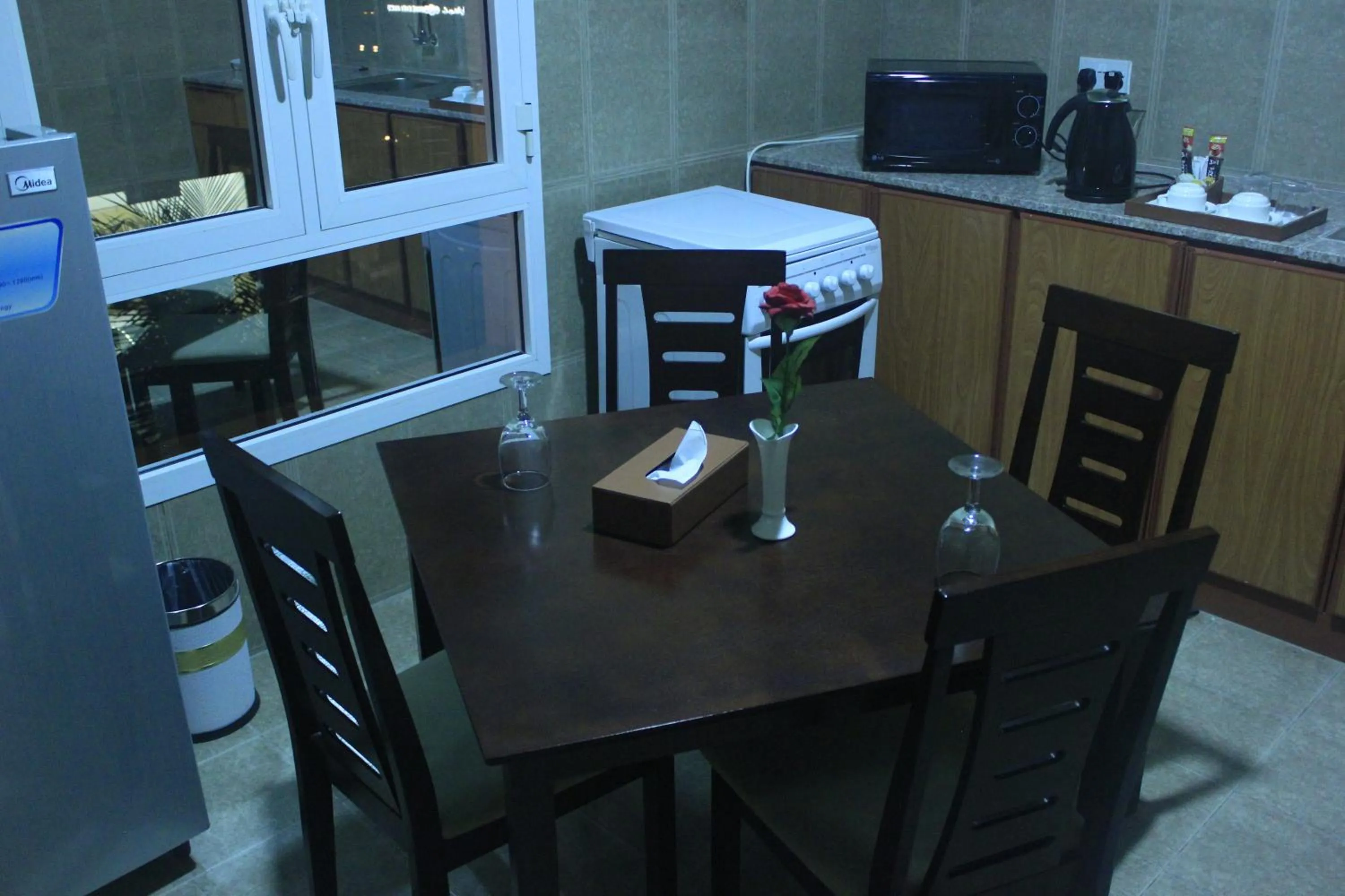 Kitchen or kitchenette in Royal Gardens Hotel