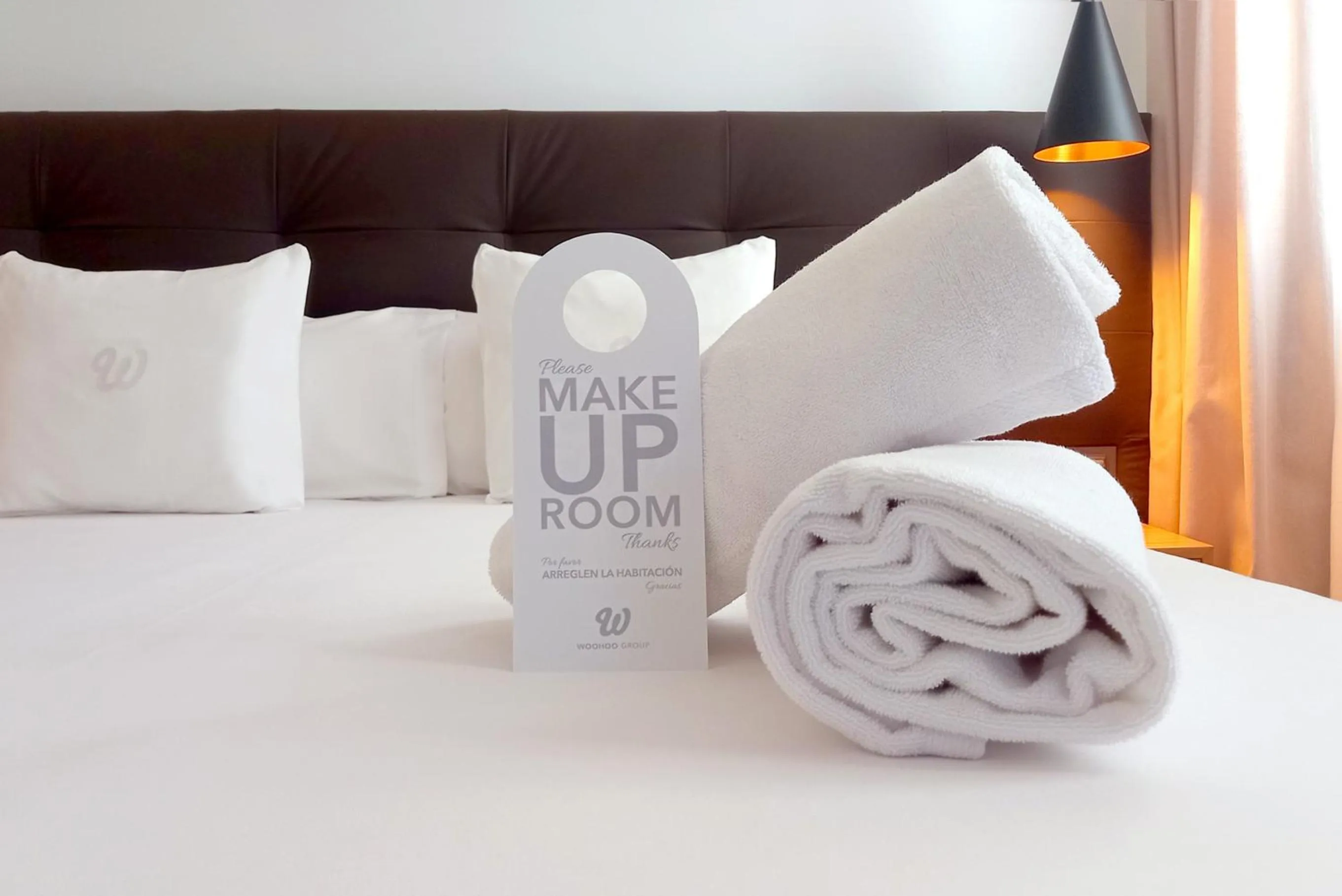 towels, Bed in Woohoo Rooms Boutique Sol