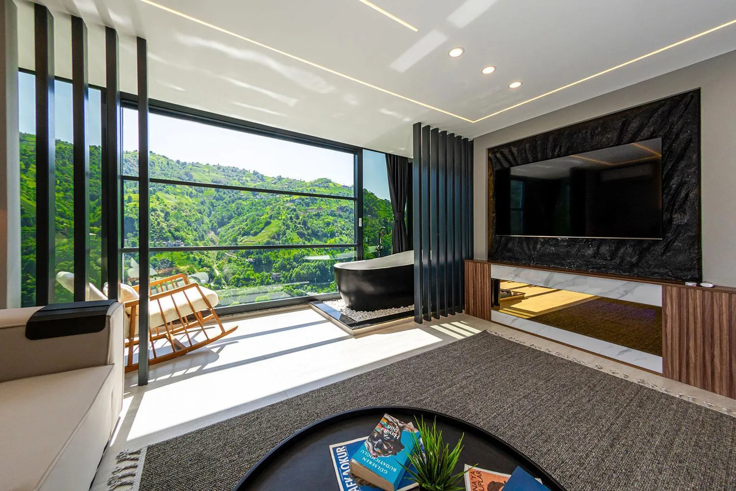 Communal lounge/ TV room in Pavri suit bungalov