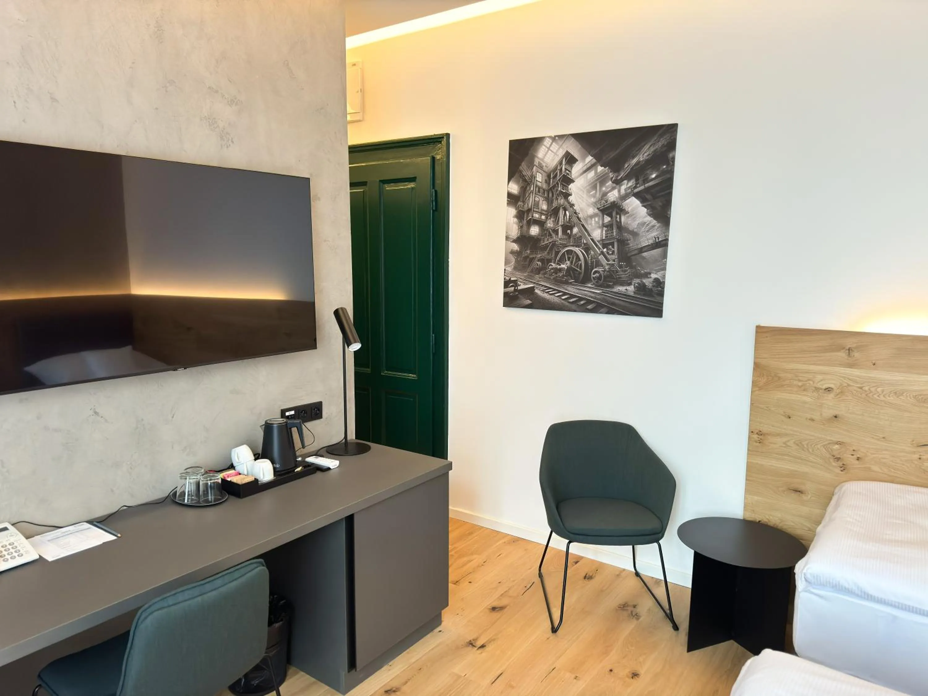 Seating area, Bed in Jan Maria Hotel