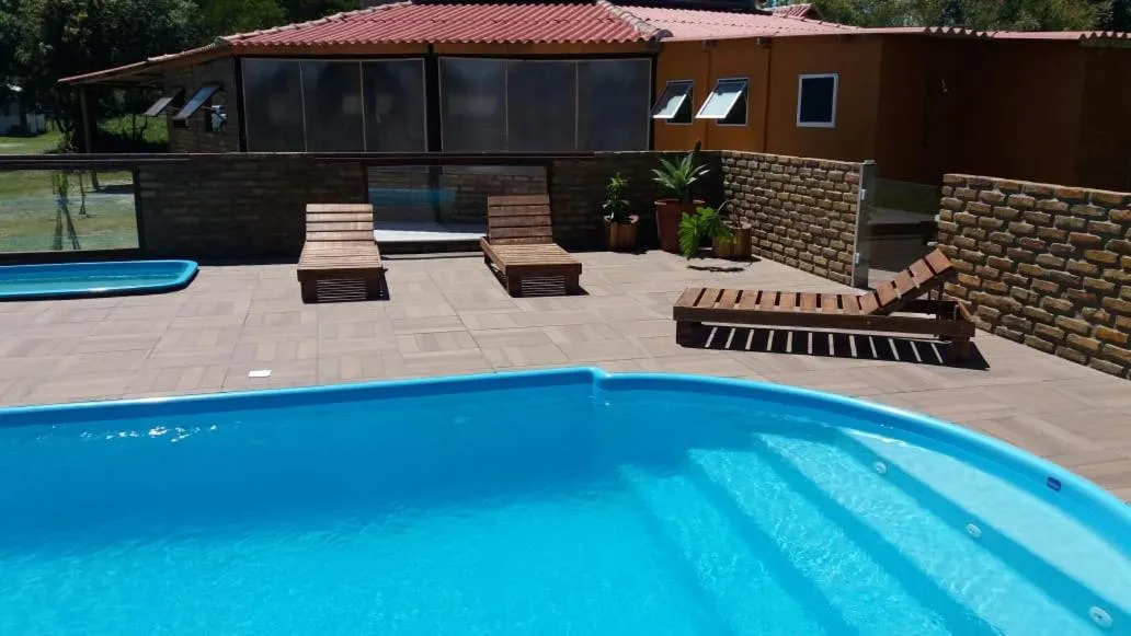 Pool view in Pousada e Lazer MARICÁ
