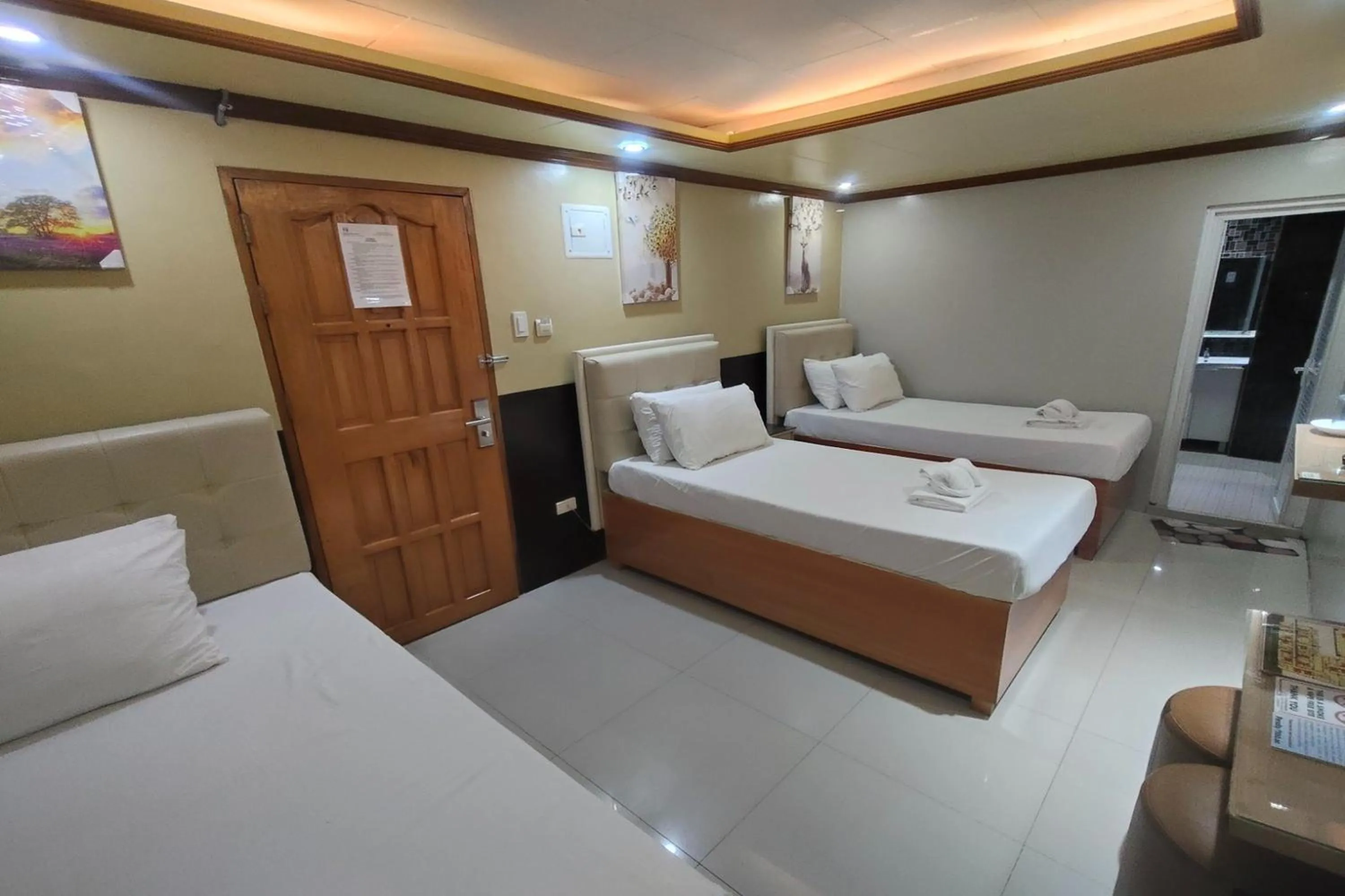 Photo of the whole room, Bed in Taj Hotel Tuguegarao