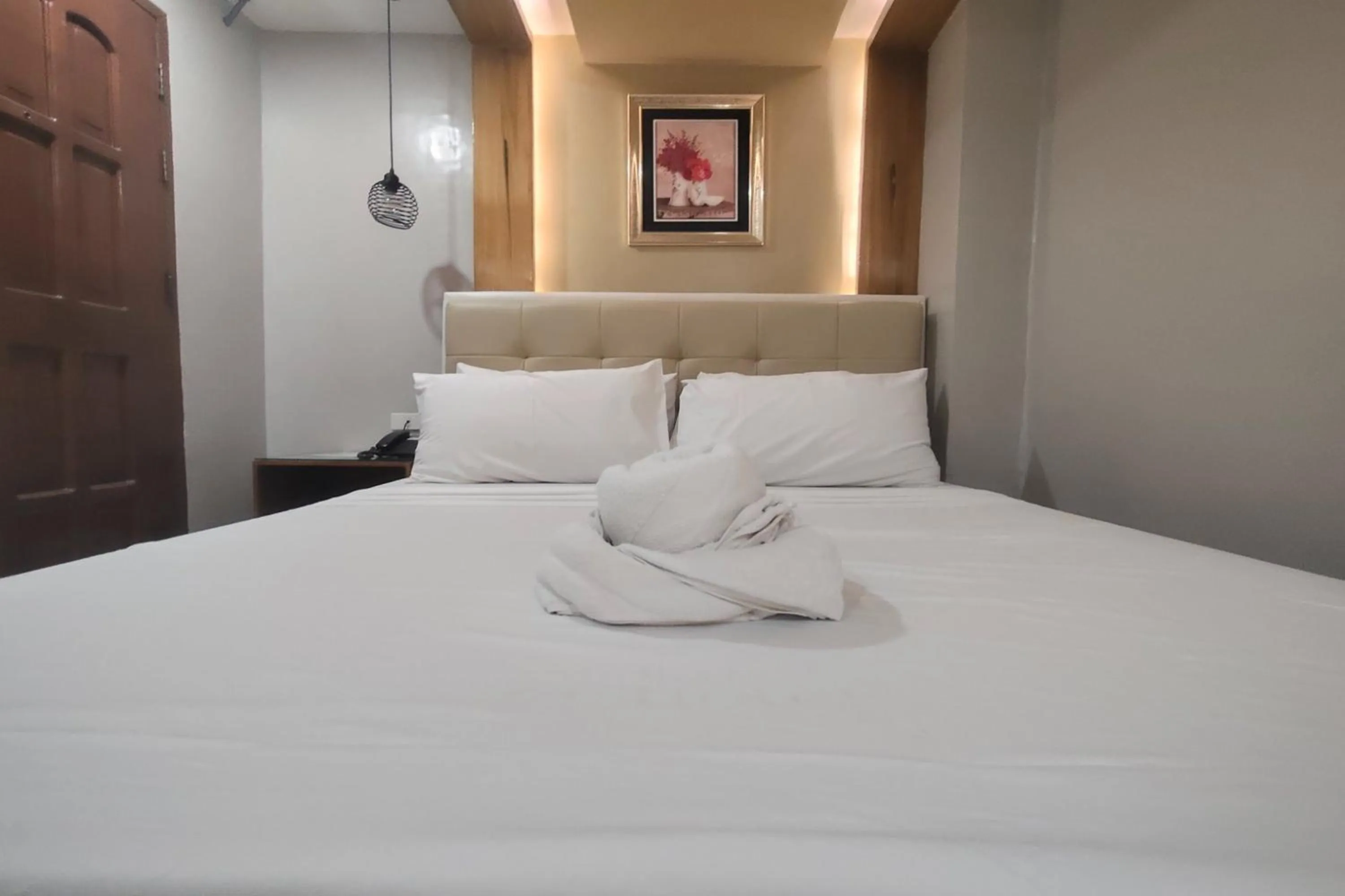 Photo of the whole room, Bed in Taj Hotel Tuguegarao