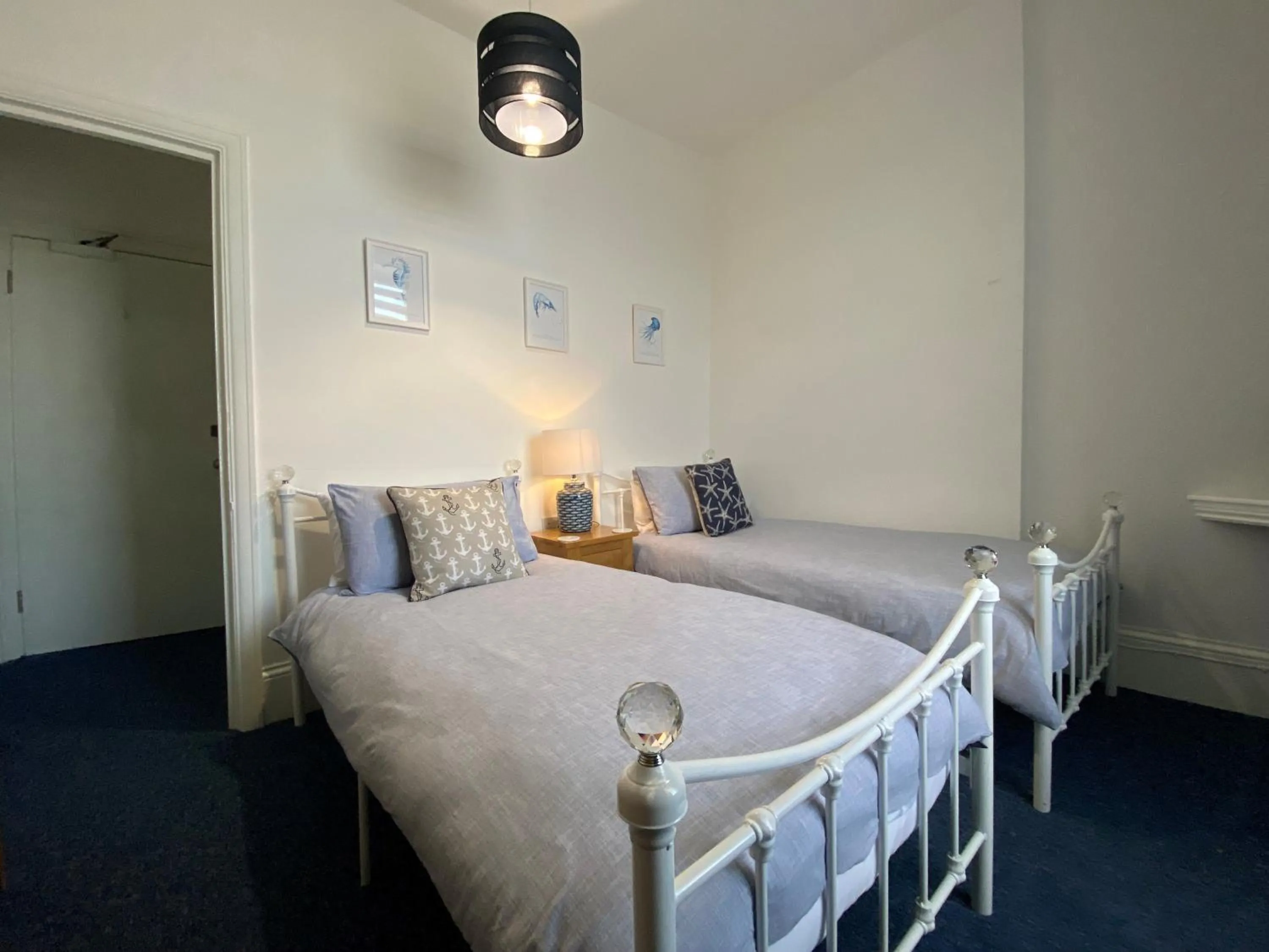 Bed in Rooms At Babbacombe