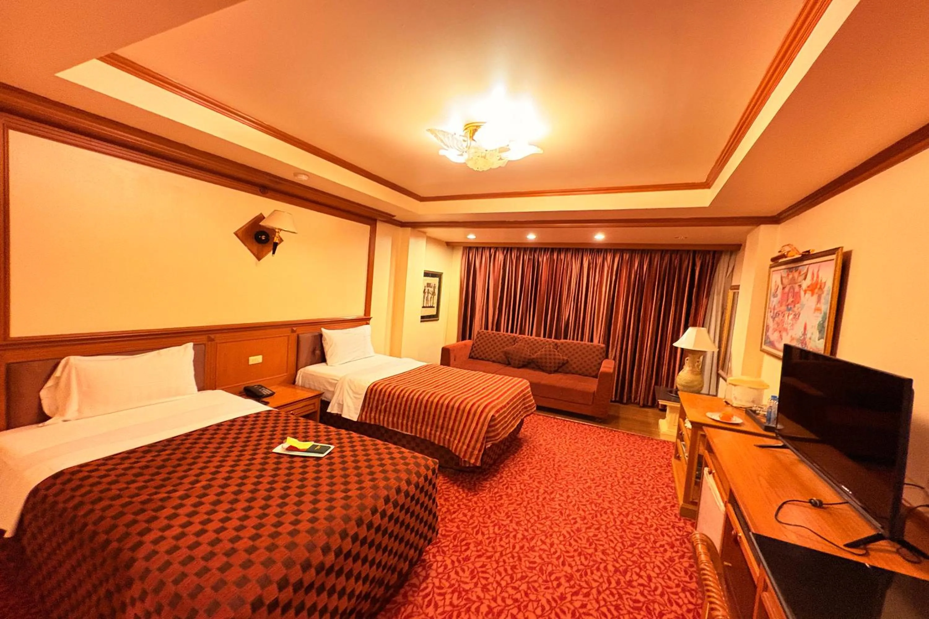 Bed in Taksila Hotel