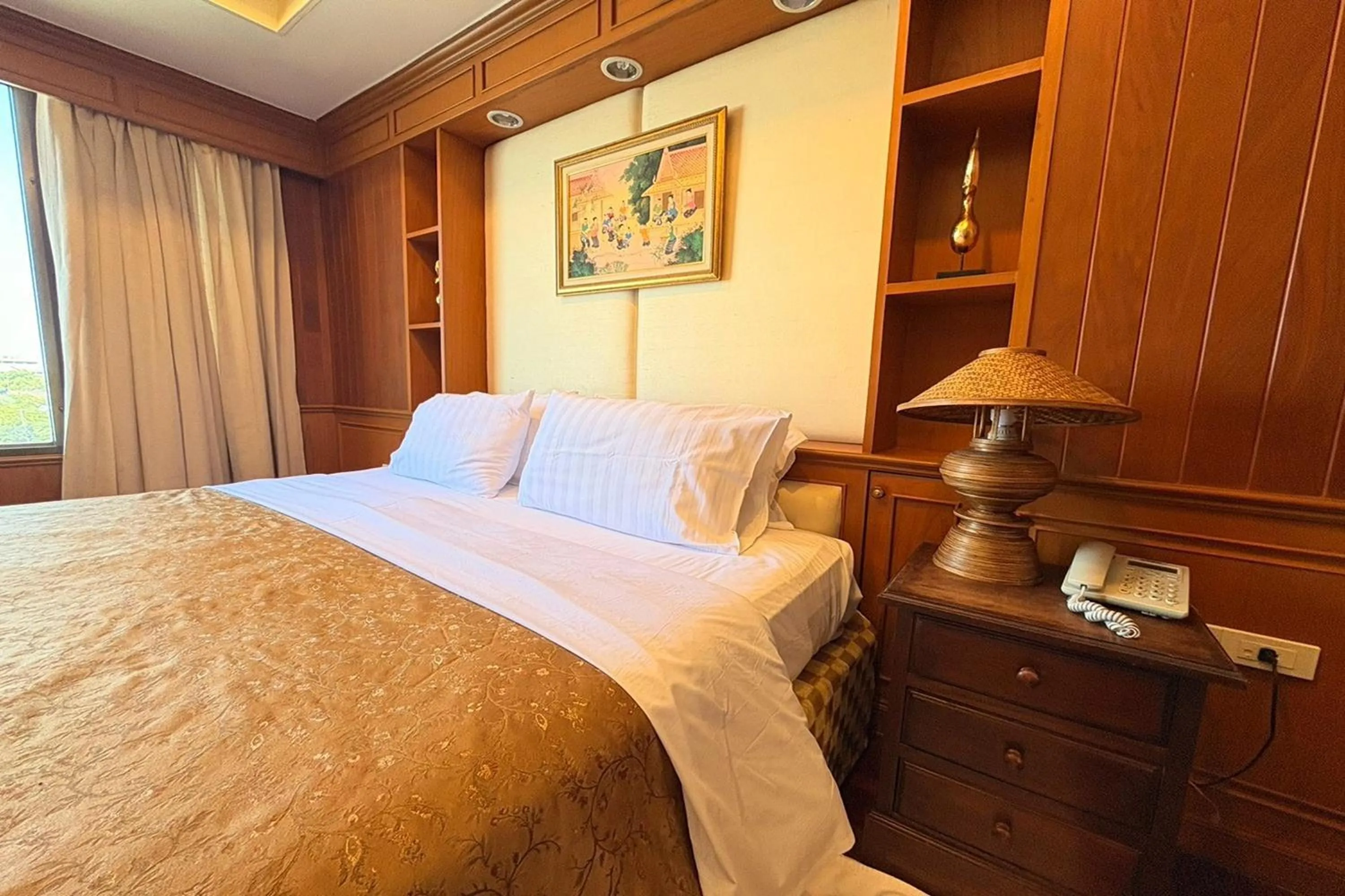 Bed in Taksila Hotel