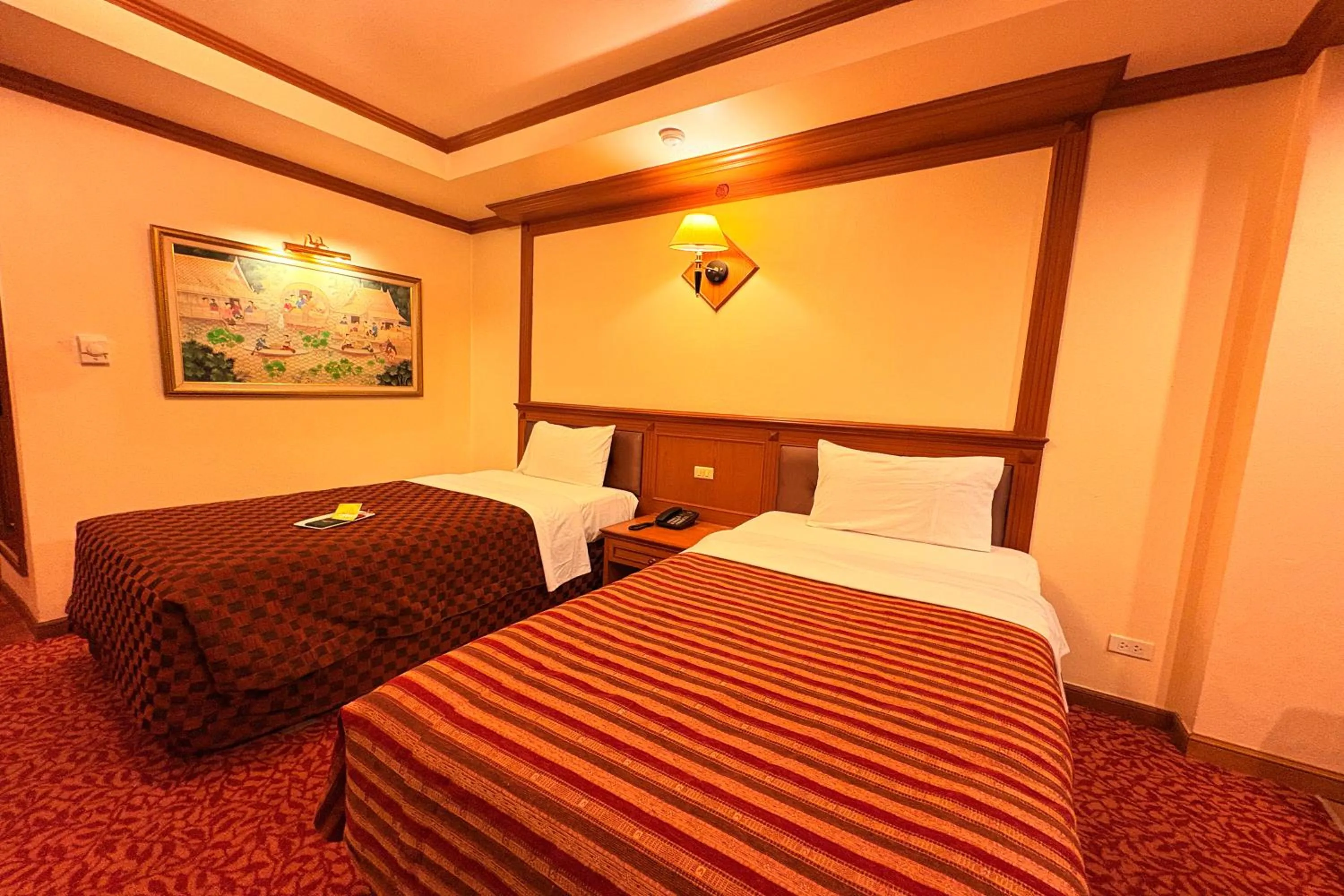 Bed in Taksila Hotel