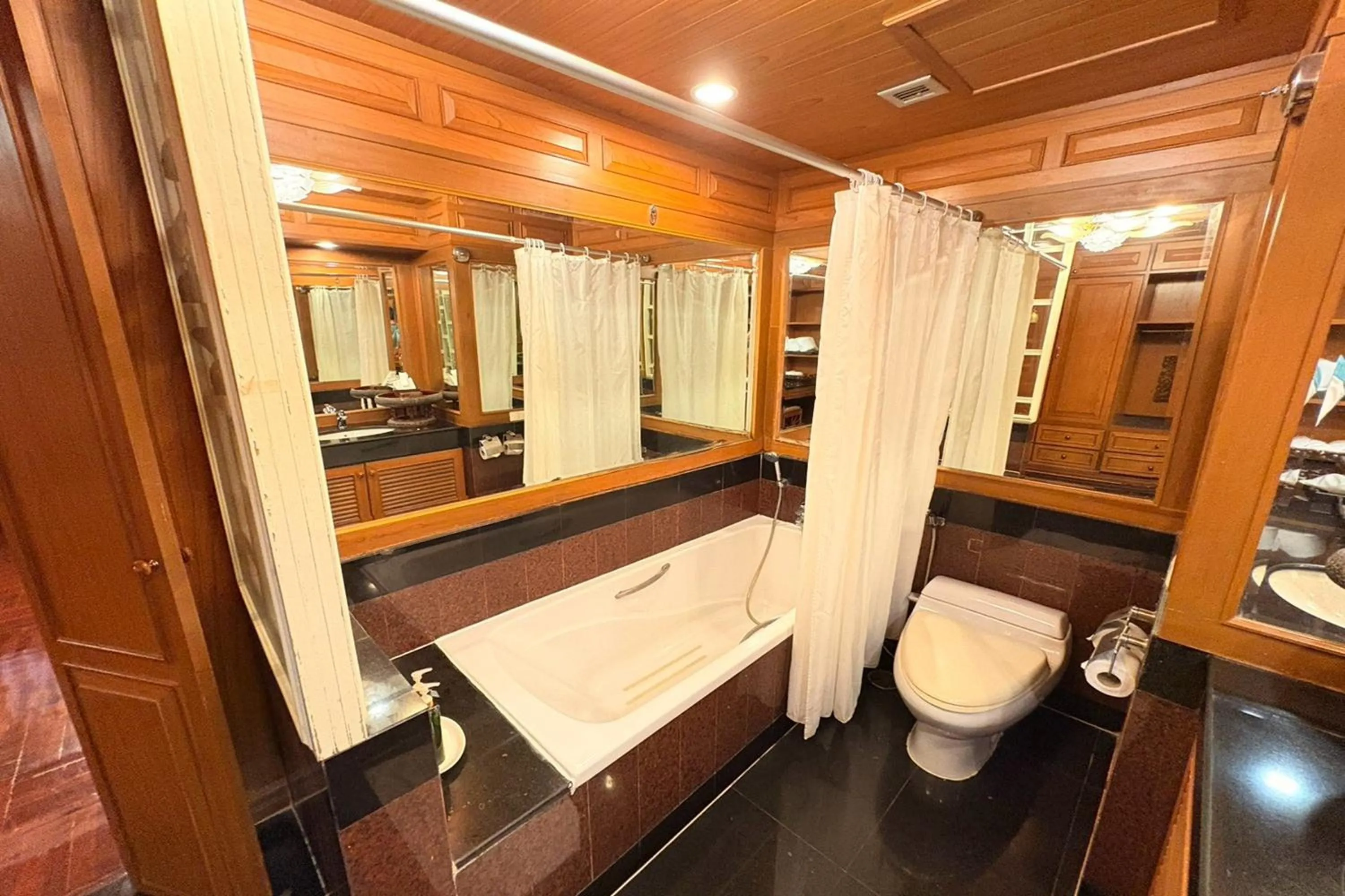 Bathroom in Taksila Hotel