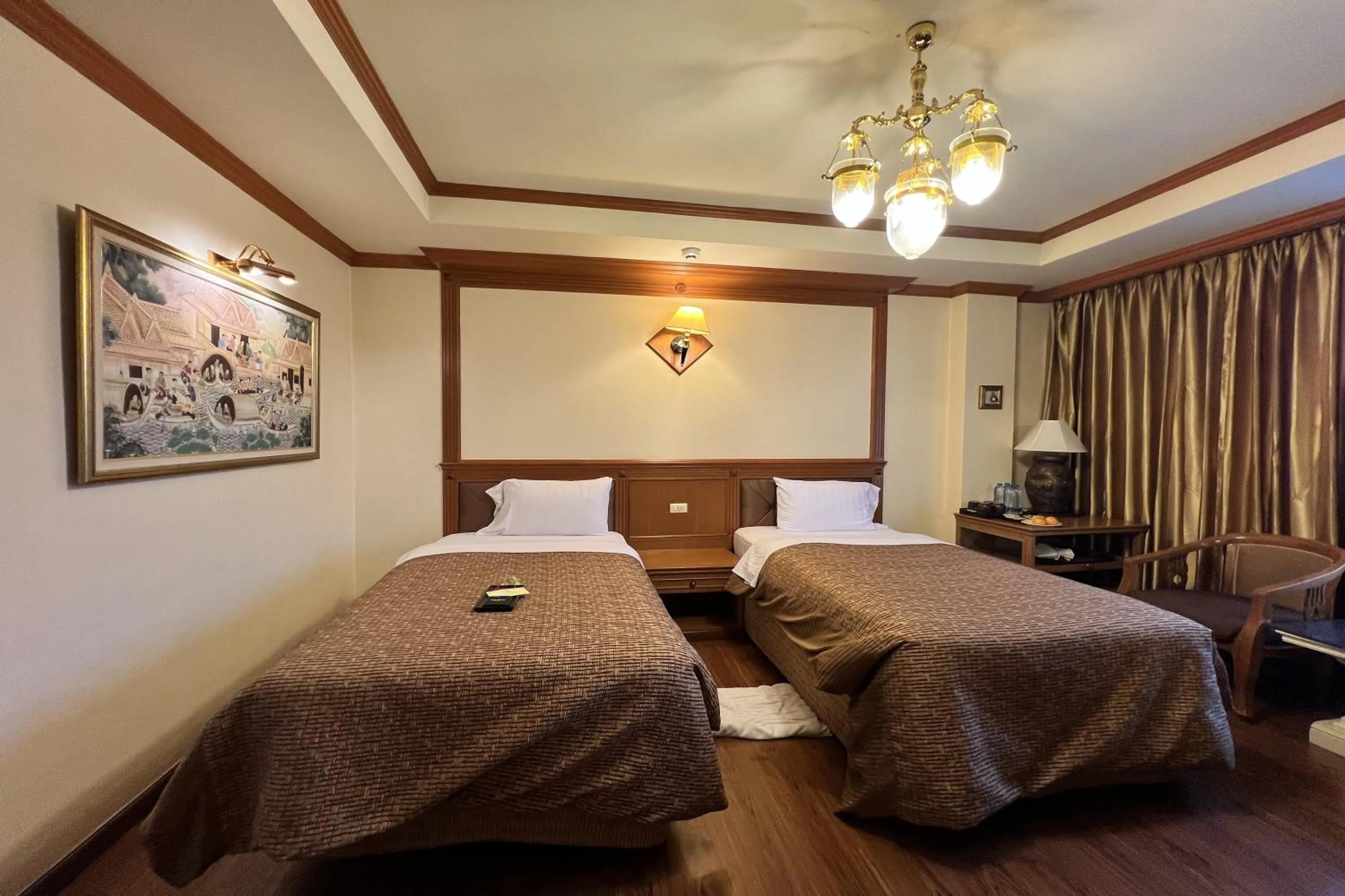 Bed in Taksila Hotel