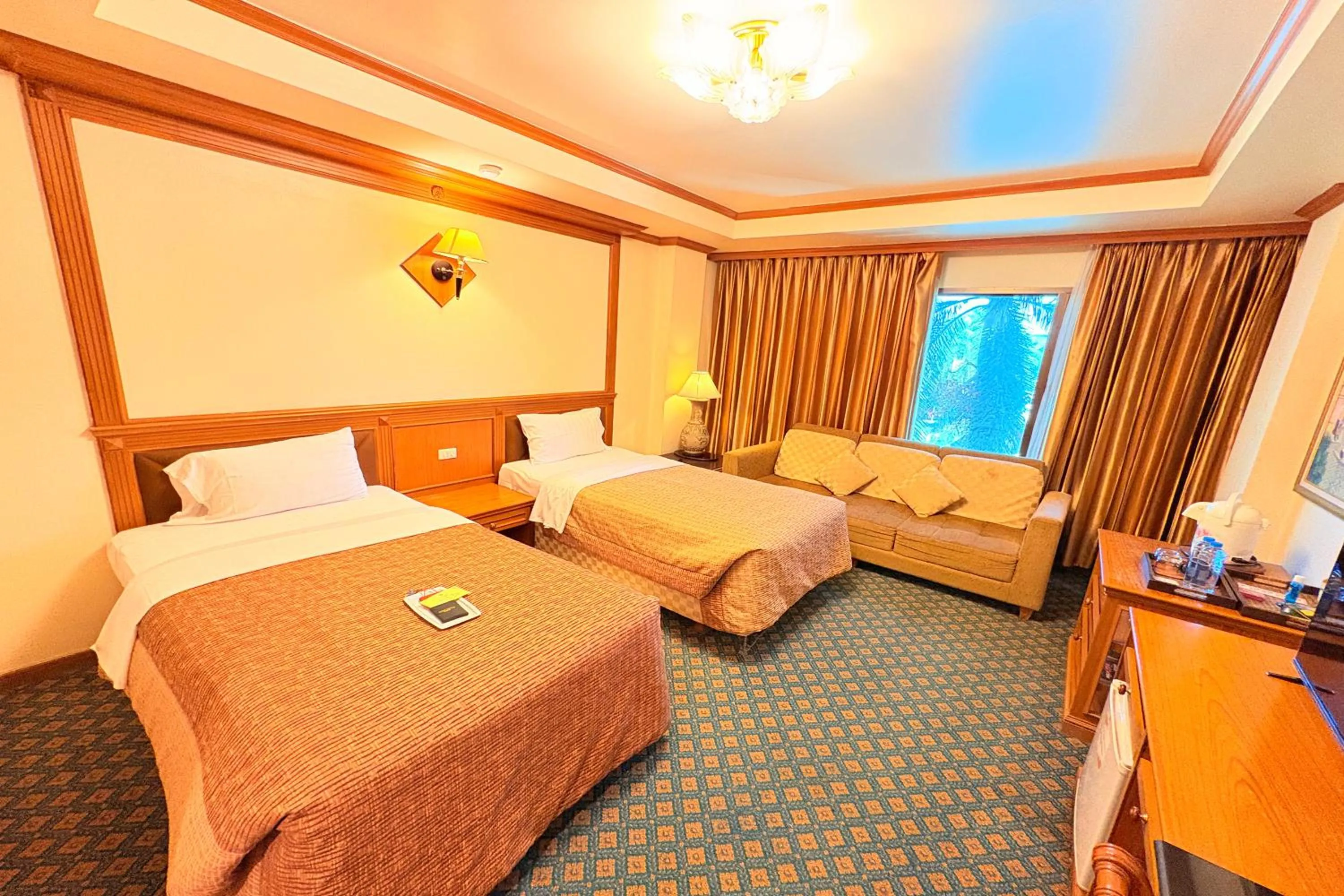 Bed in Taksila Hotel