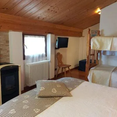 Bed in B&B La Soldanella