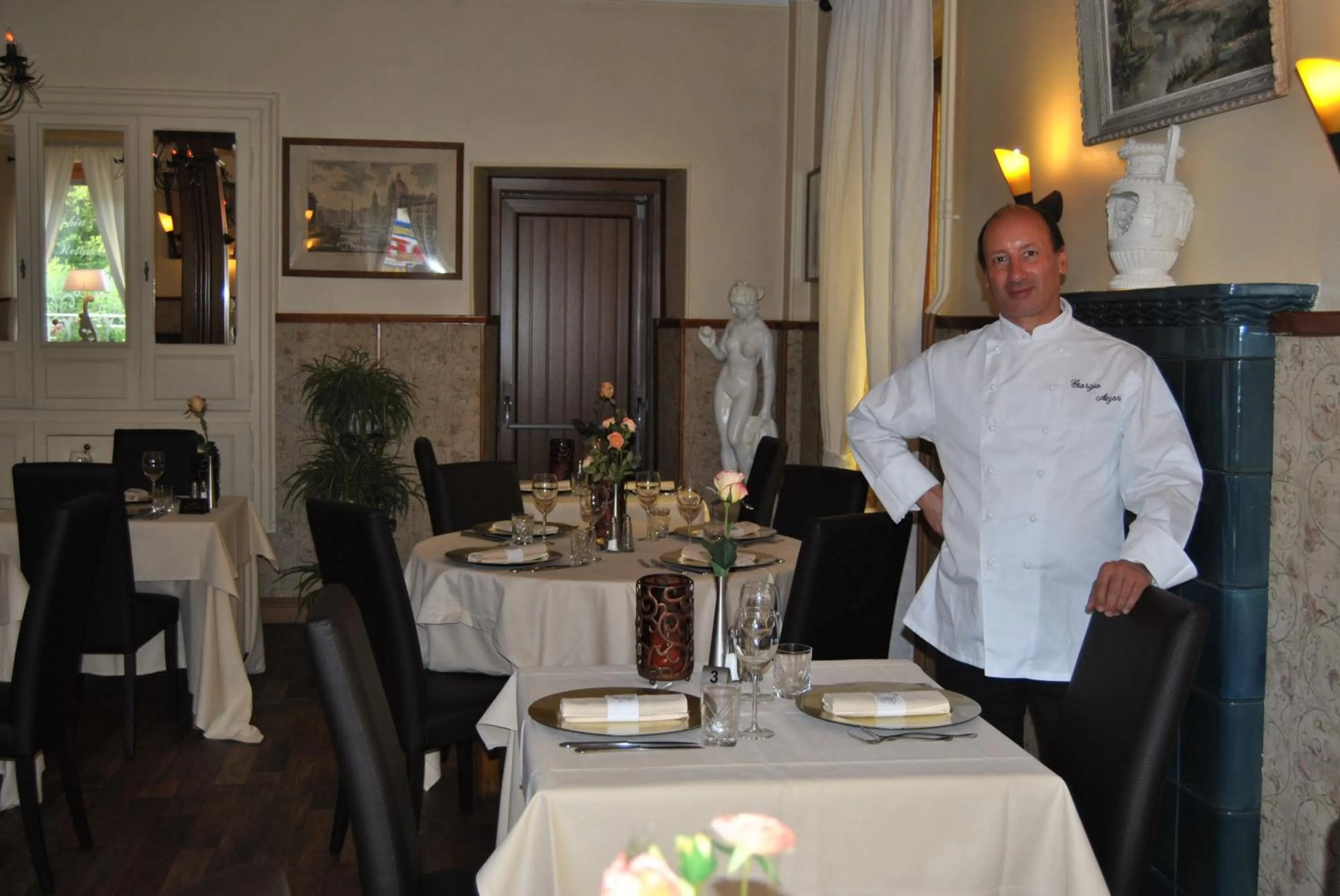 Staff in Logis Hôtel Restaurant La Tête Des Faux