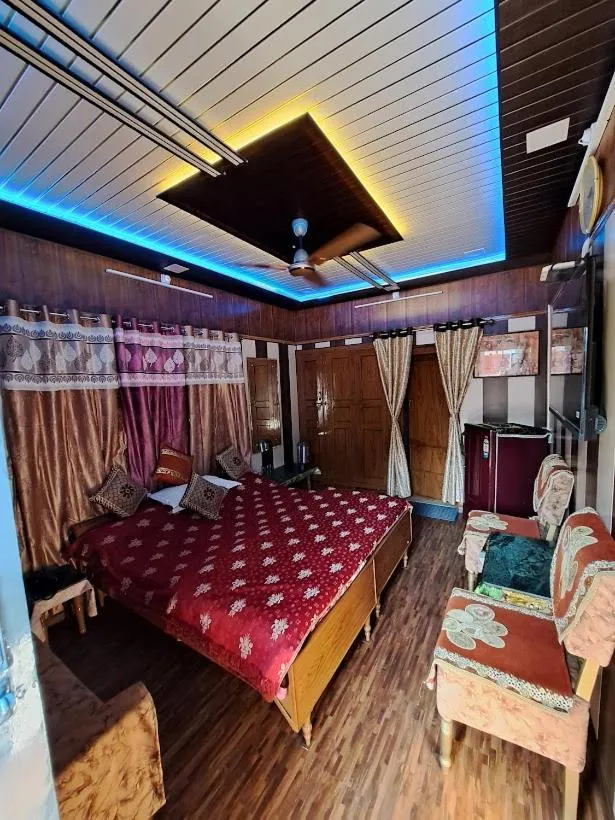 Photo of the whole room, Bed in Jagan Hotel & Restaurant