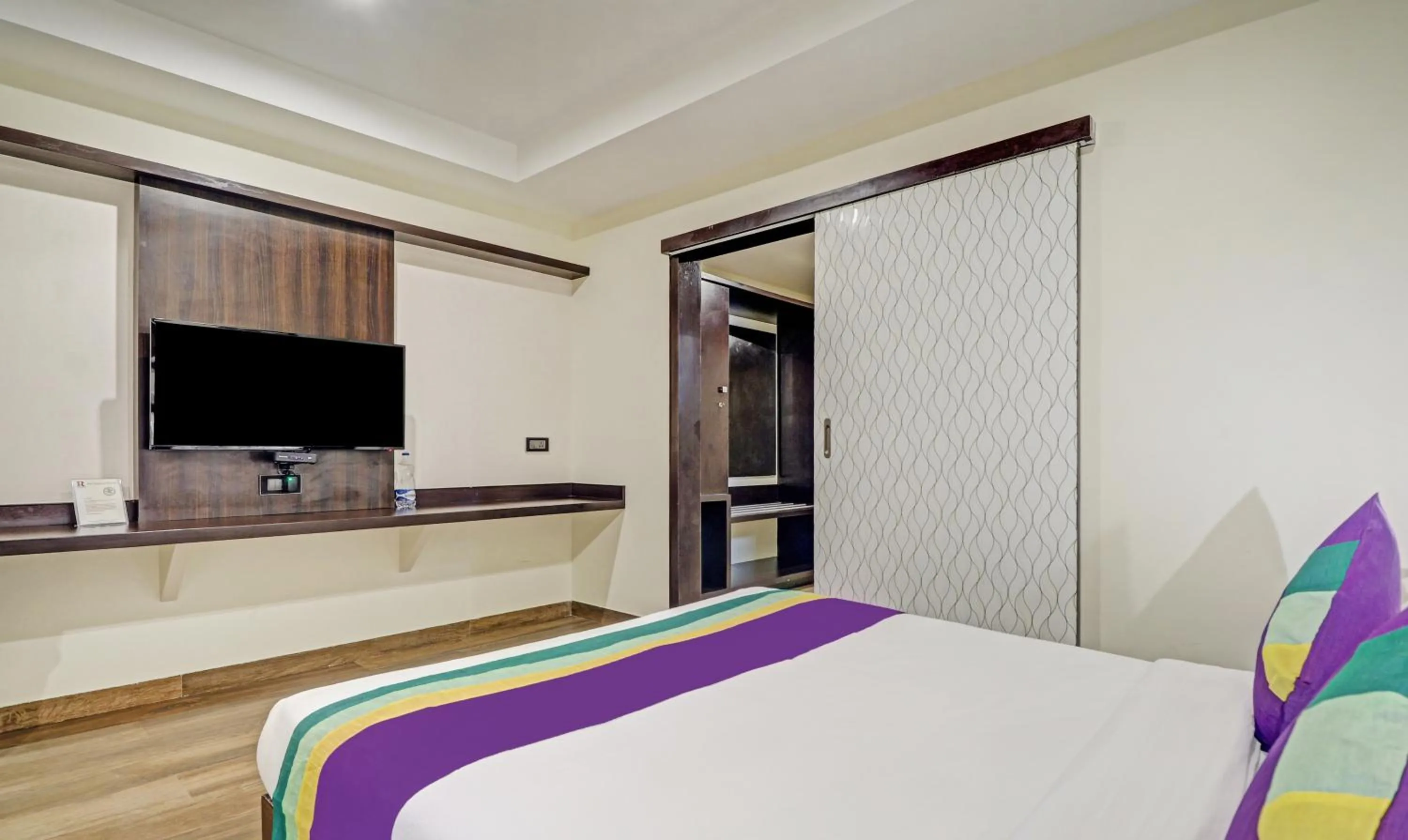 Bedroom, Bed in Treebo Premium Raj Vista Global Village
