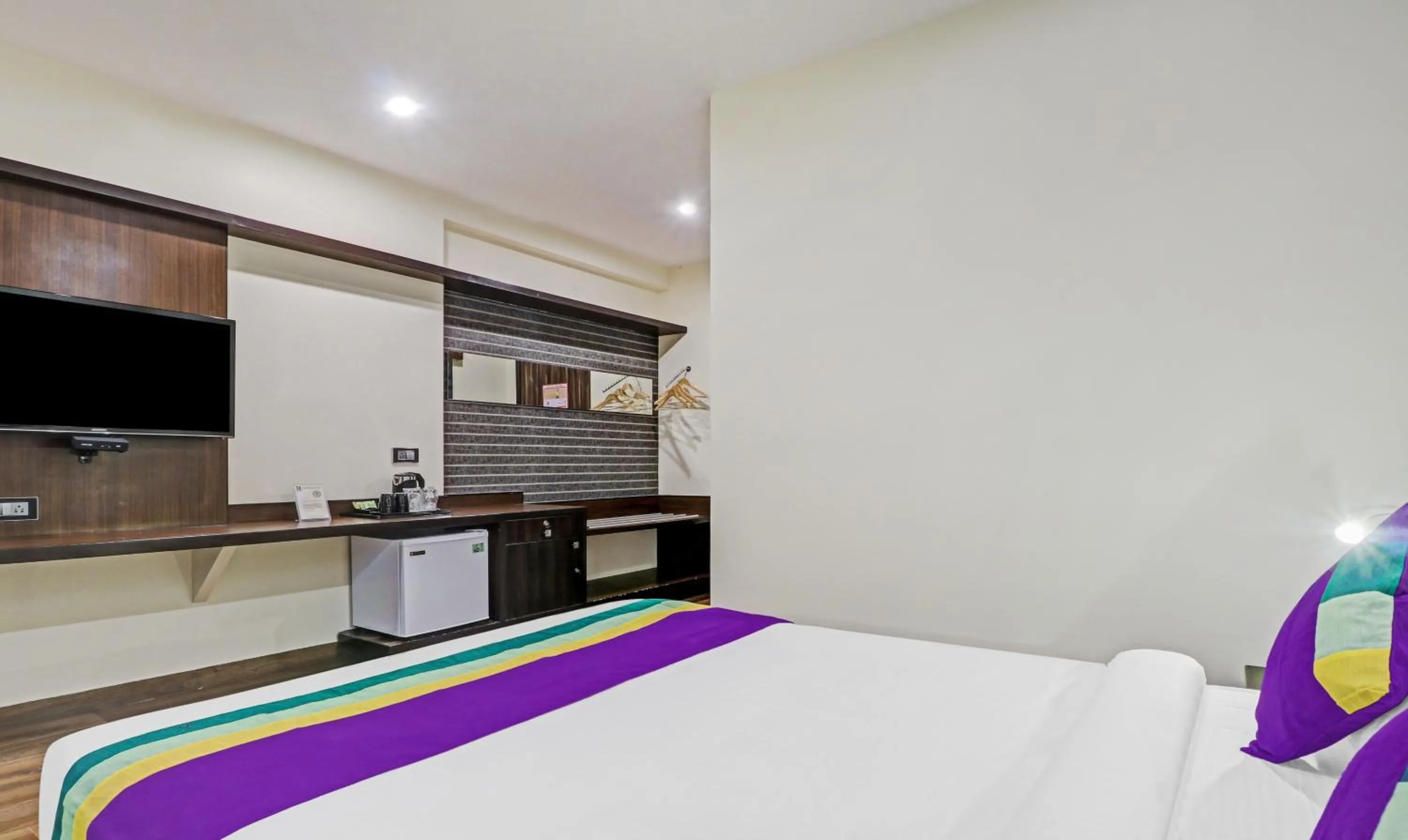 Bedroom, Bed in Treebo Premium Raj Vista Global Village