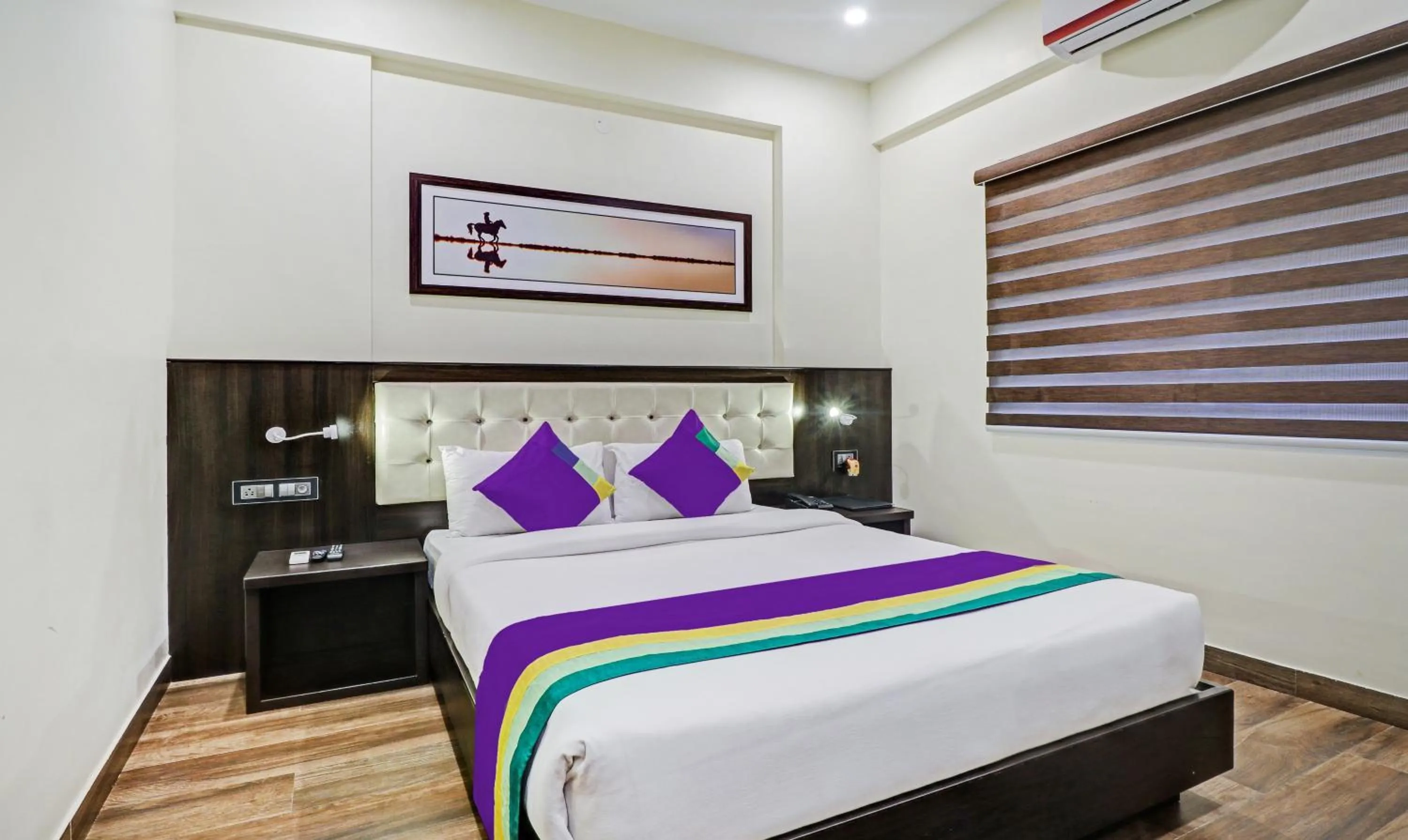Bedroom, Bed in Treebo Premium Raj Vista Global Village