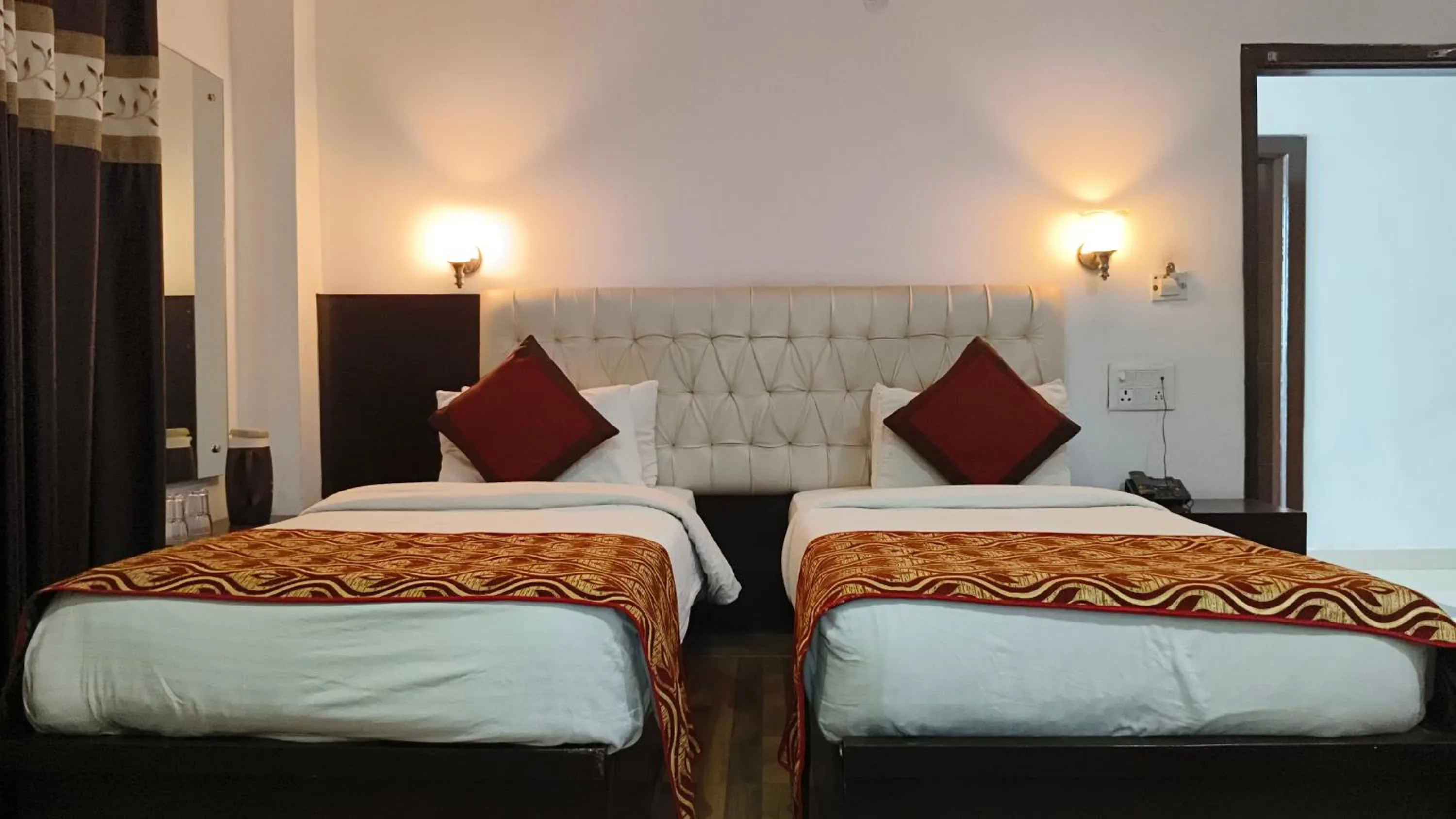 Bed in Hotel Samovar by Goyal Hoteleirs